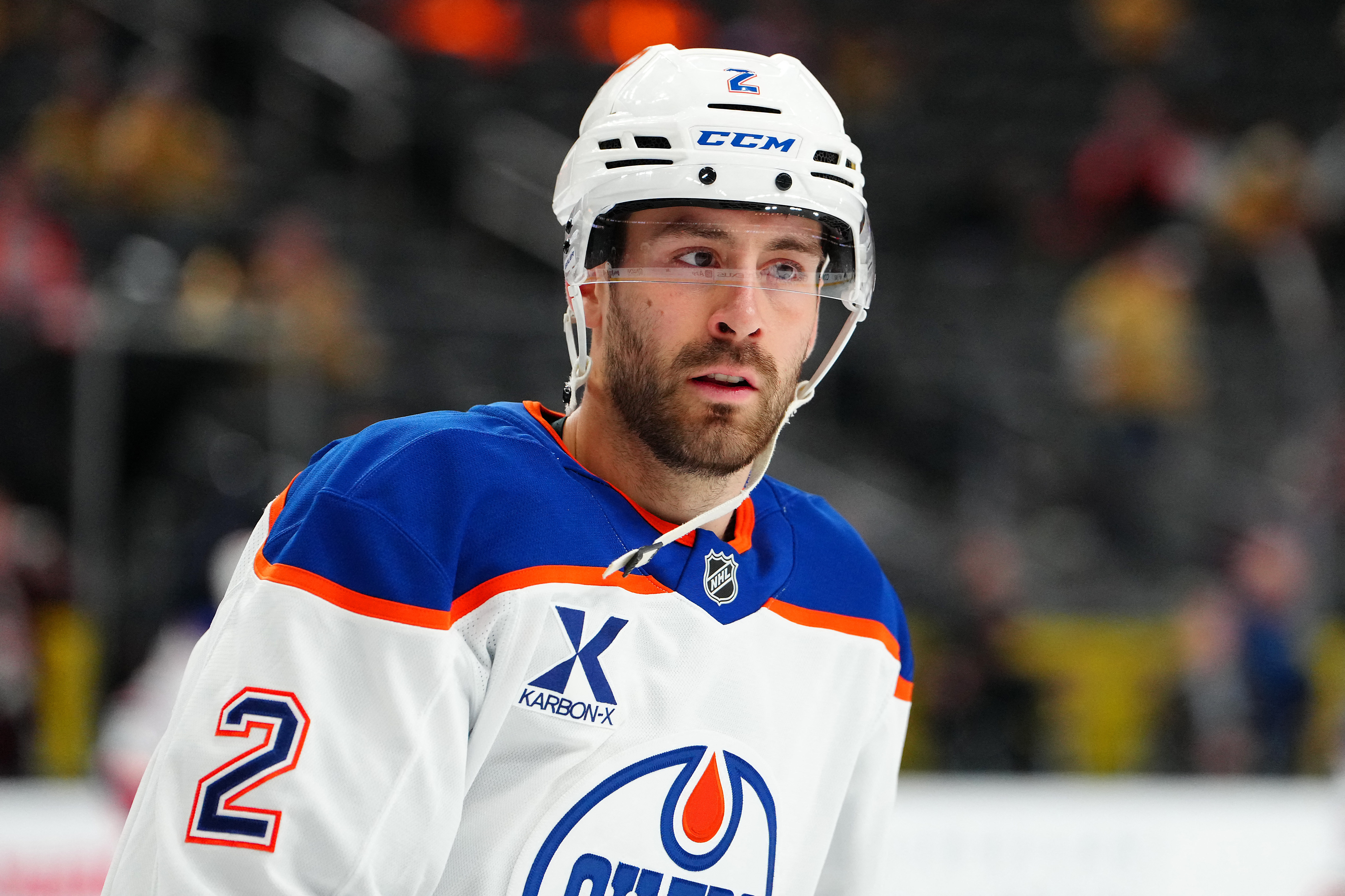 Evan Bouchard wearing Edmonton's white road jersey during an earlier 2026 NHL game
