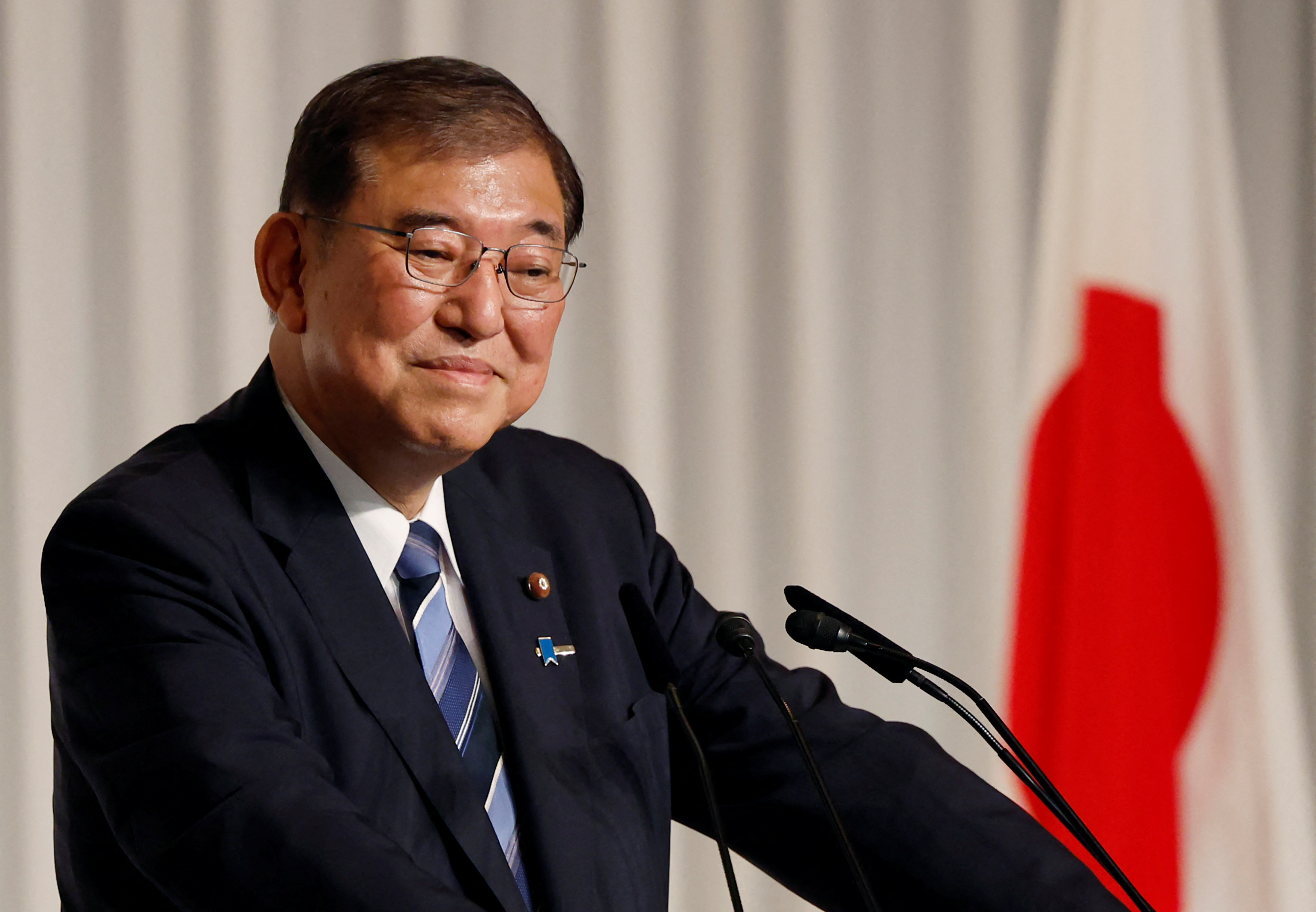 Japan incoming PM Ishiba signals focus on boosting wages, consumption |  Reuters