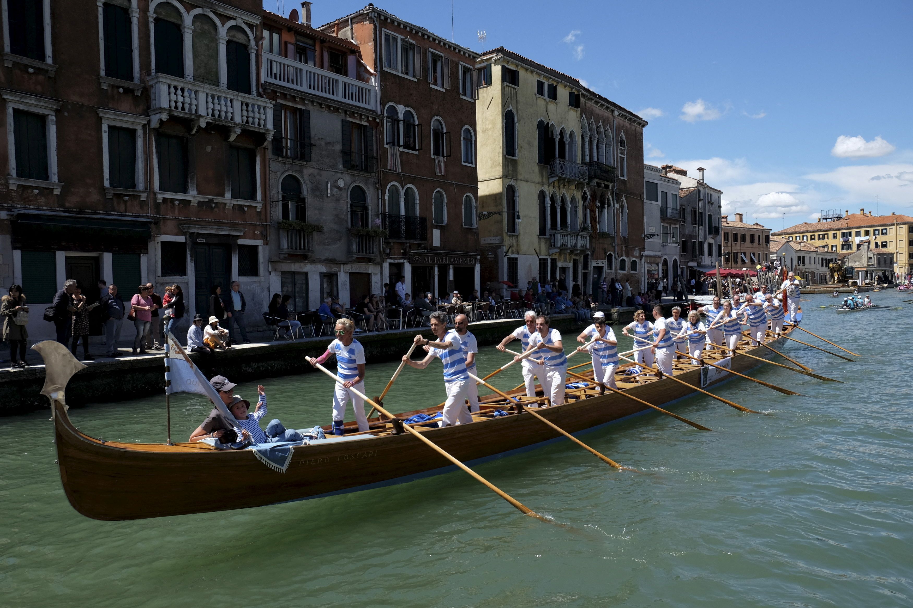 Rowers take part in the Vogalonga, or Long Row, in the Venice lagoon