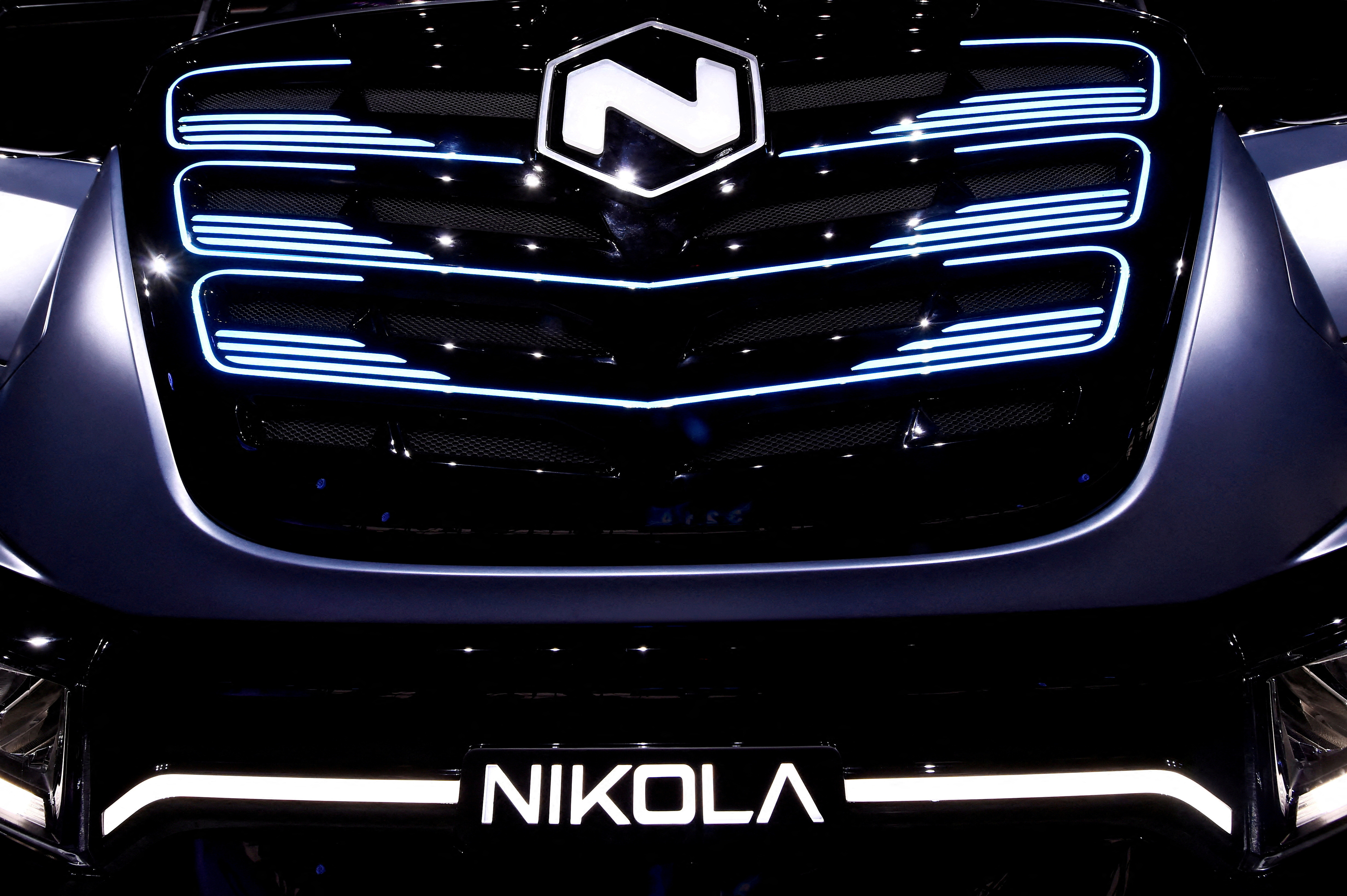 Nikola's logo is pictured at an event in Turin