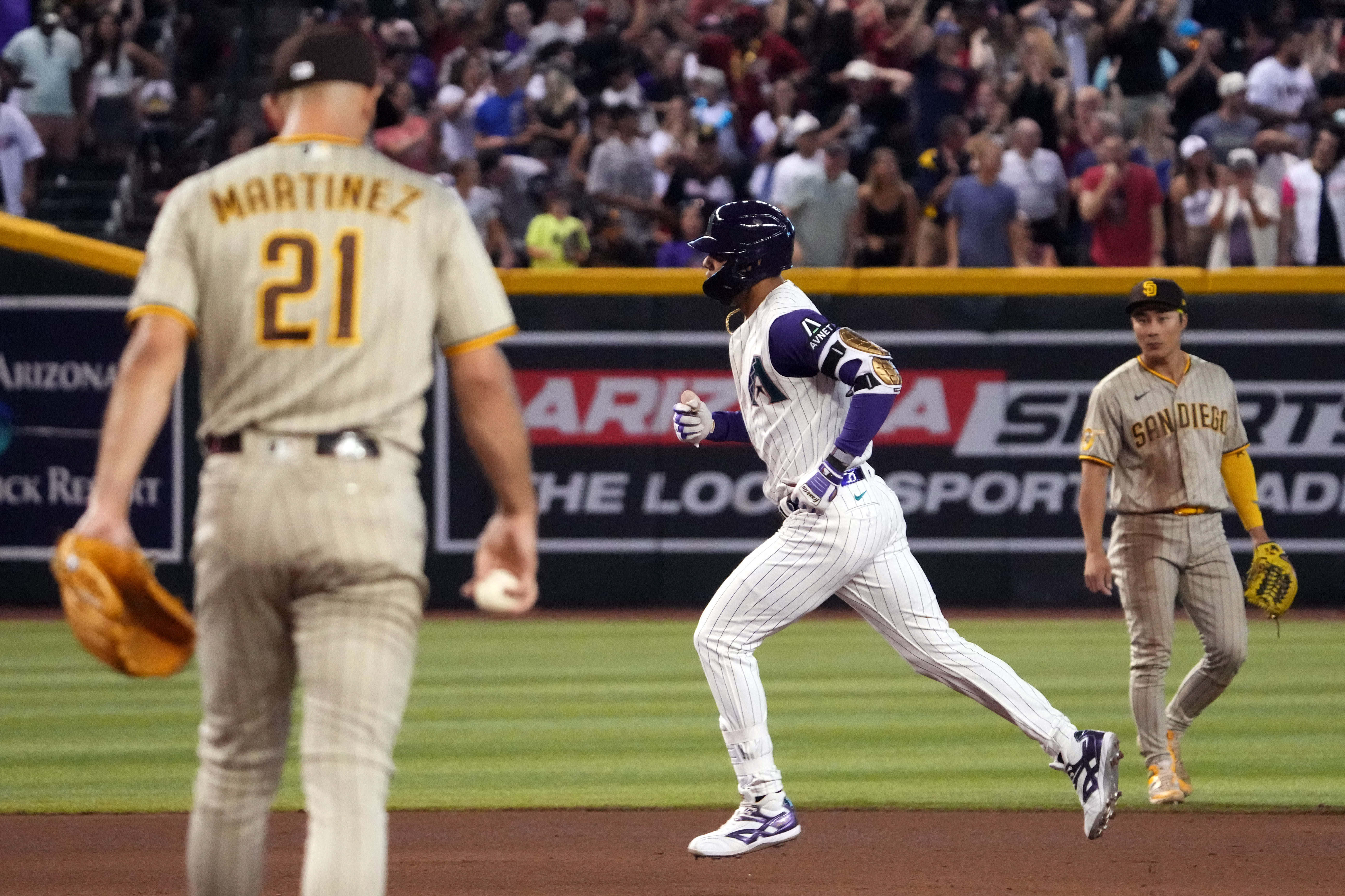 Diamondbacks pull together late win over Padres