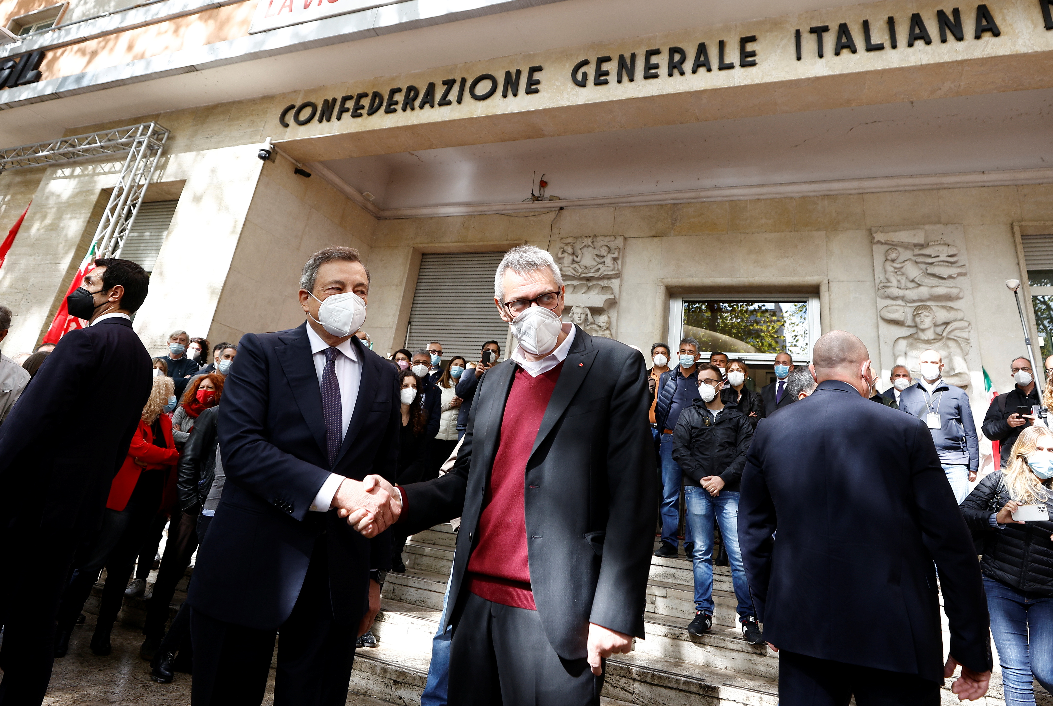 Italian PM Draghi visits trade union headquarters trashed during anti-vax riot, in Rome