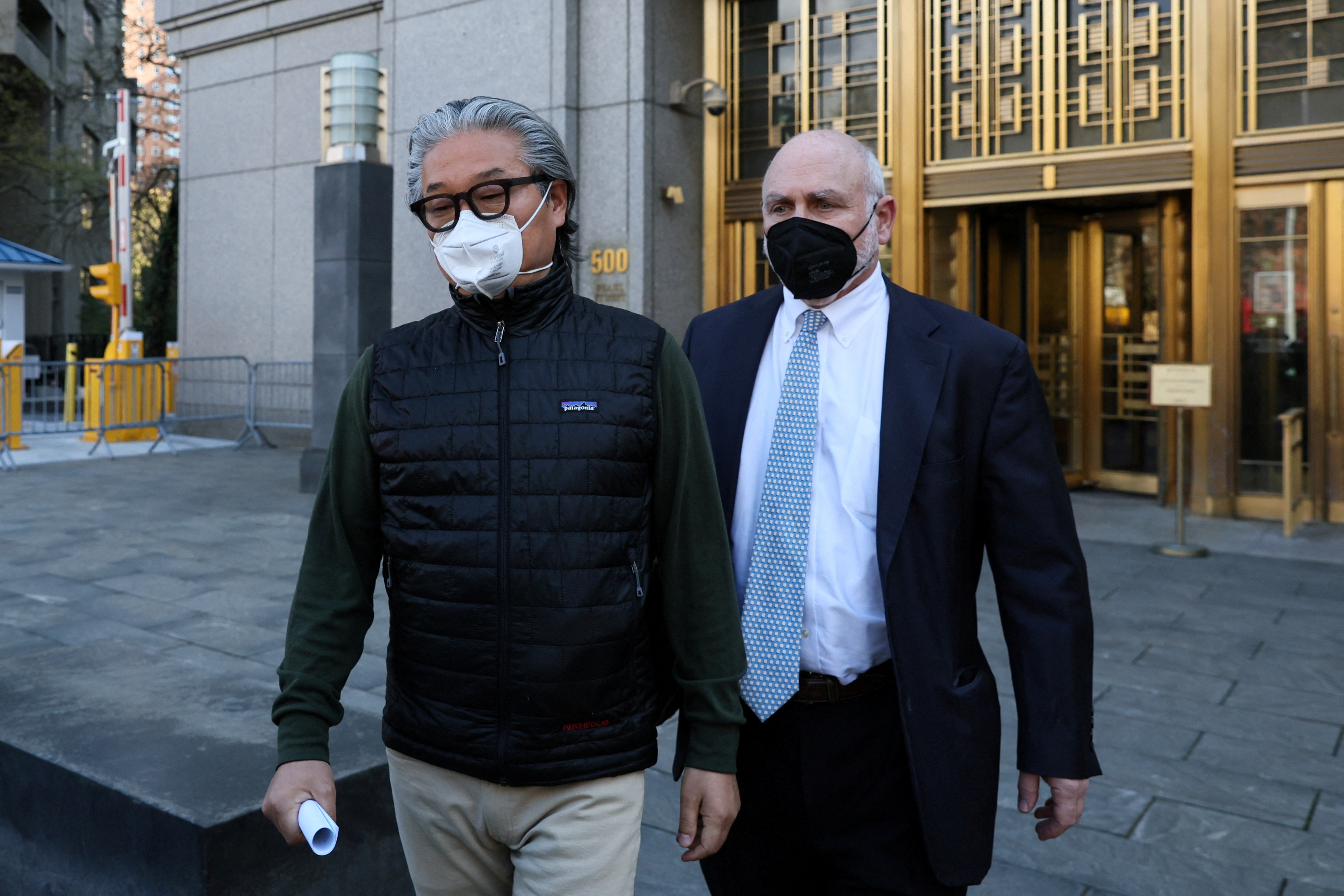 Sung Kook (Bill) Hwang exits the Manhattan federal courthouse in New York City