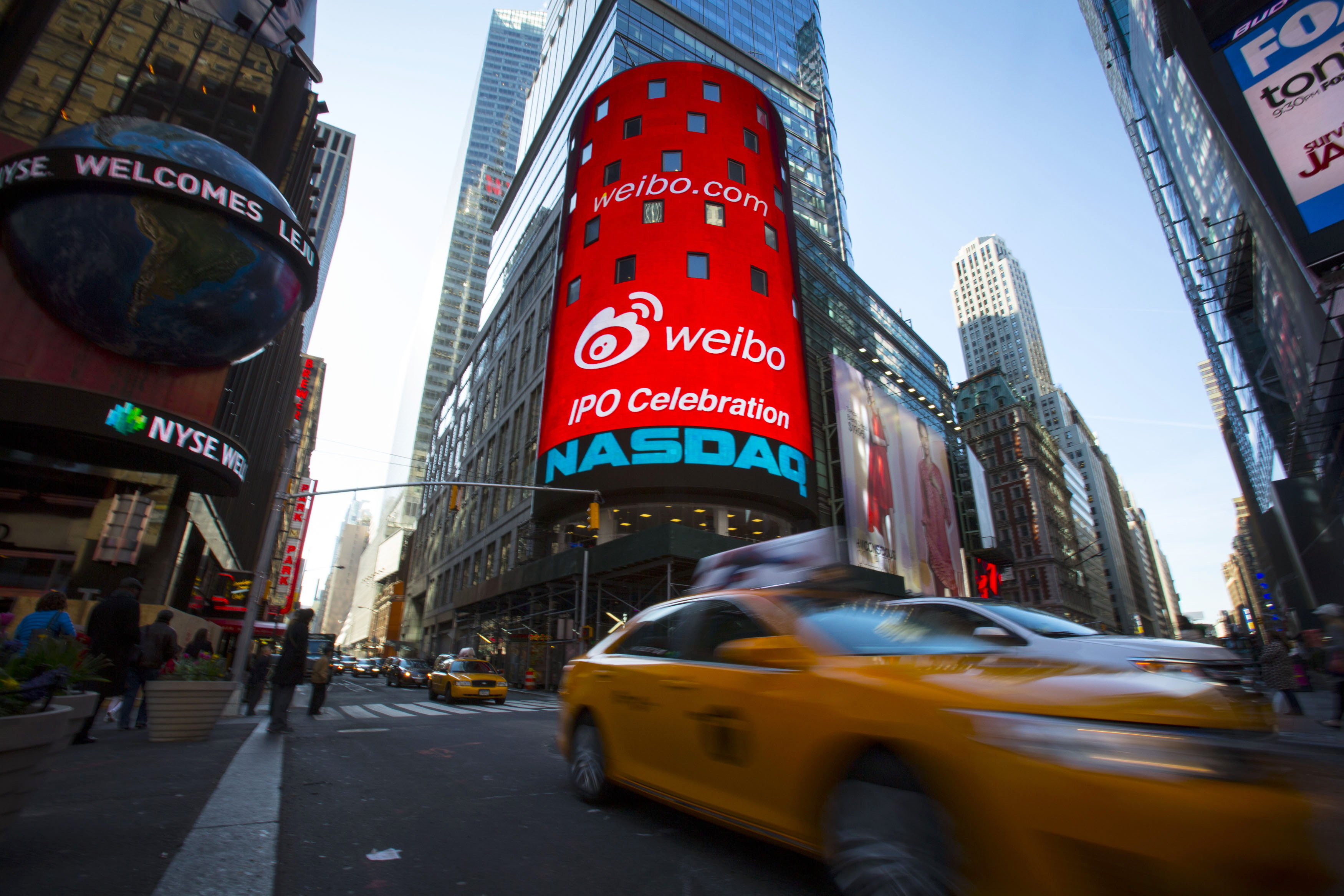 The Weibo logo is seen at the NASDAQ MarketSite in Times Square in celebration of its initial public offering (IPO) on The NASDAQ Stock Market in New York