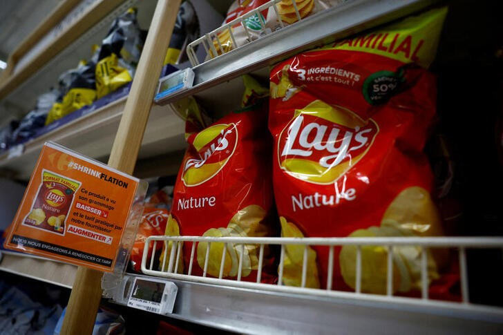 Customers shop in a supermarket near Paris