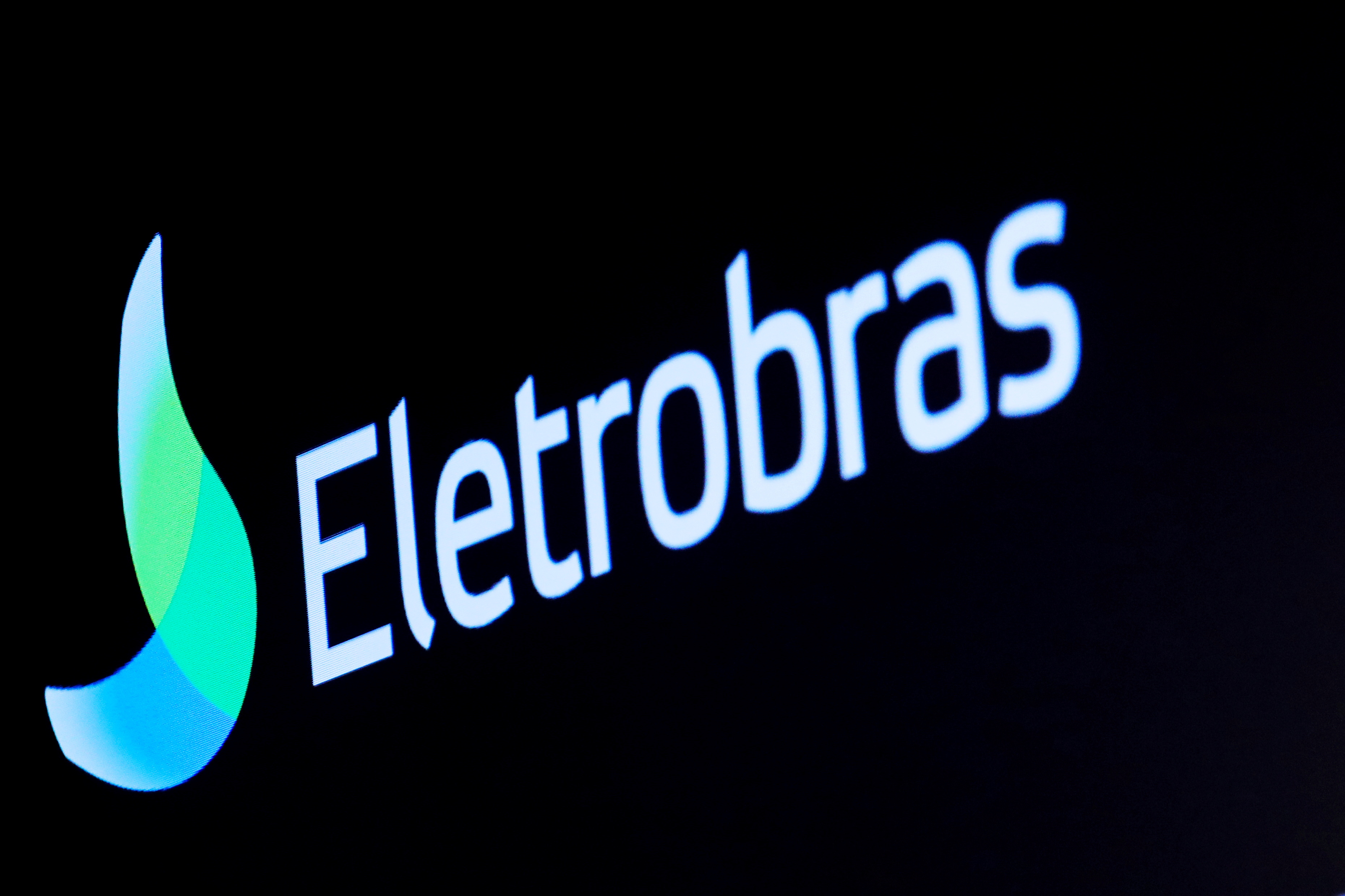 The logo for Eletrobras, a Brazilian electric utilities company, is displayed on a screen on the floor at the New York Stock Exchange (NYSE) in New York, U.S., April 9, 2019. REUTERS/Brendan McDermid/File Photo