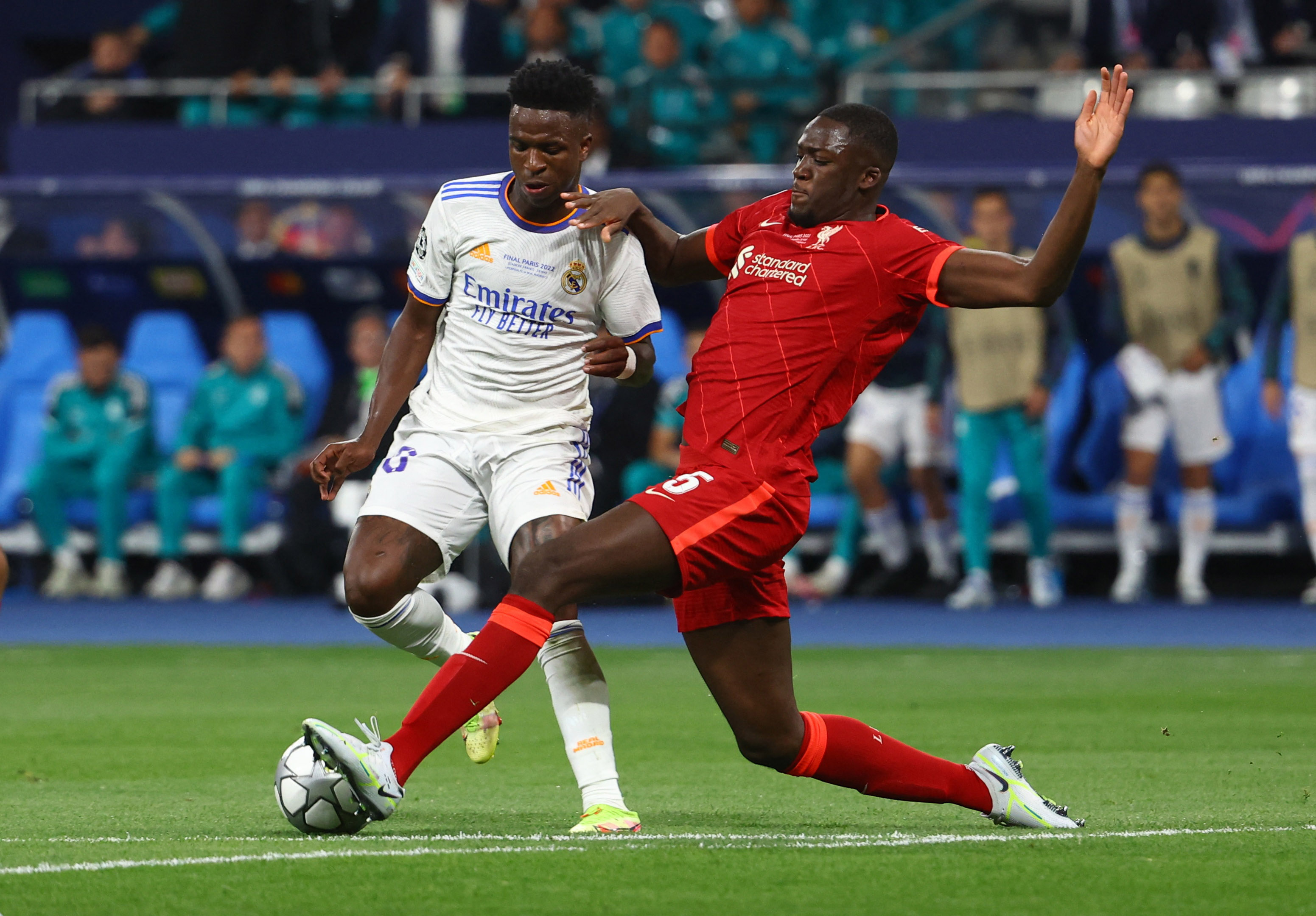 Liverpool's Andrew Robertson heads the ball during the Champions League  final soccer match between Liverpool and Real Madrid at the Stade de France  in Saint Denis near Paris, Saturday, May 28, 2022. (