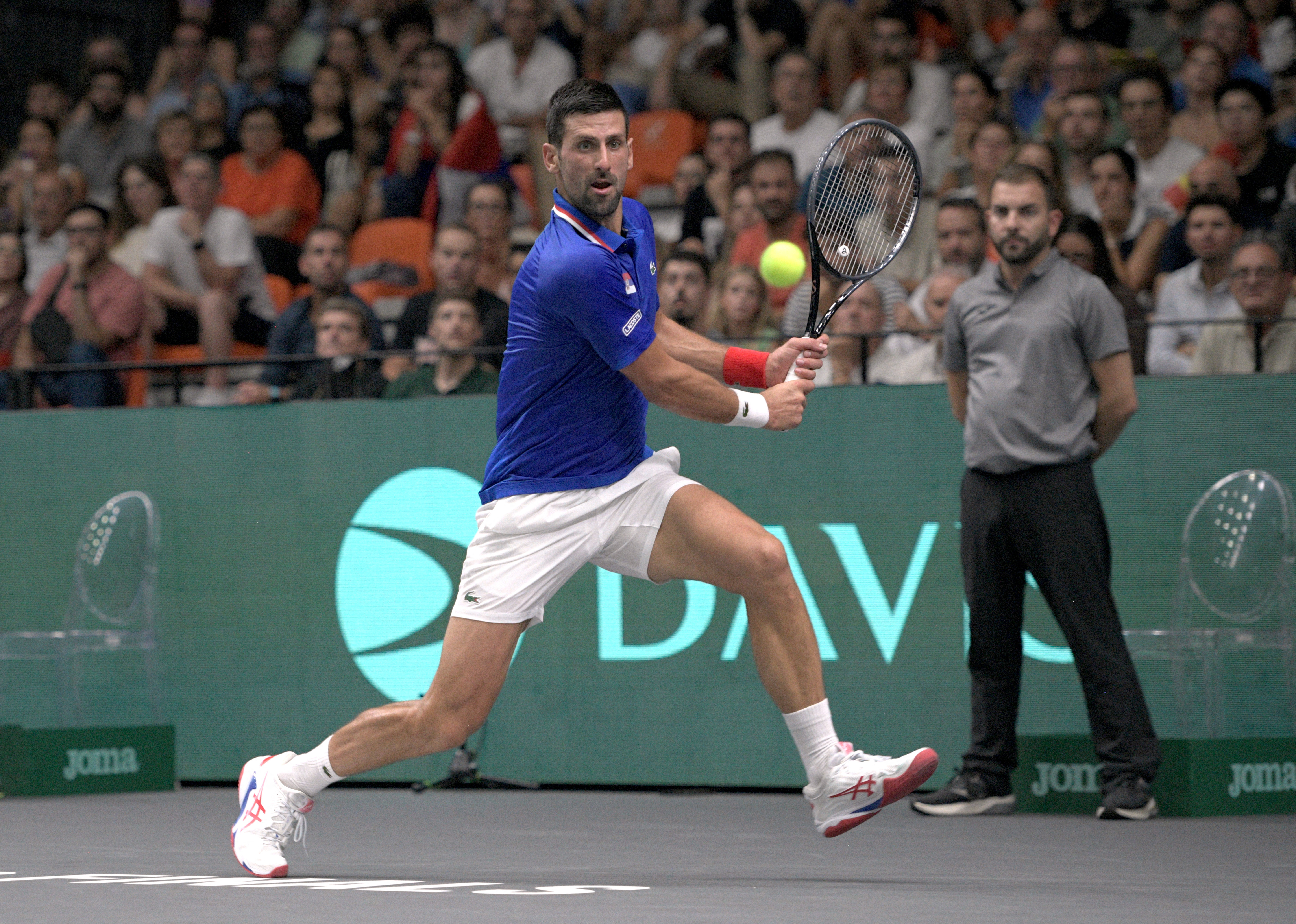 Djokovic propels Serbia into Davis Cup quarter-finals, Britain win Reuters