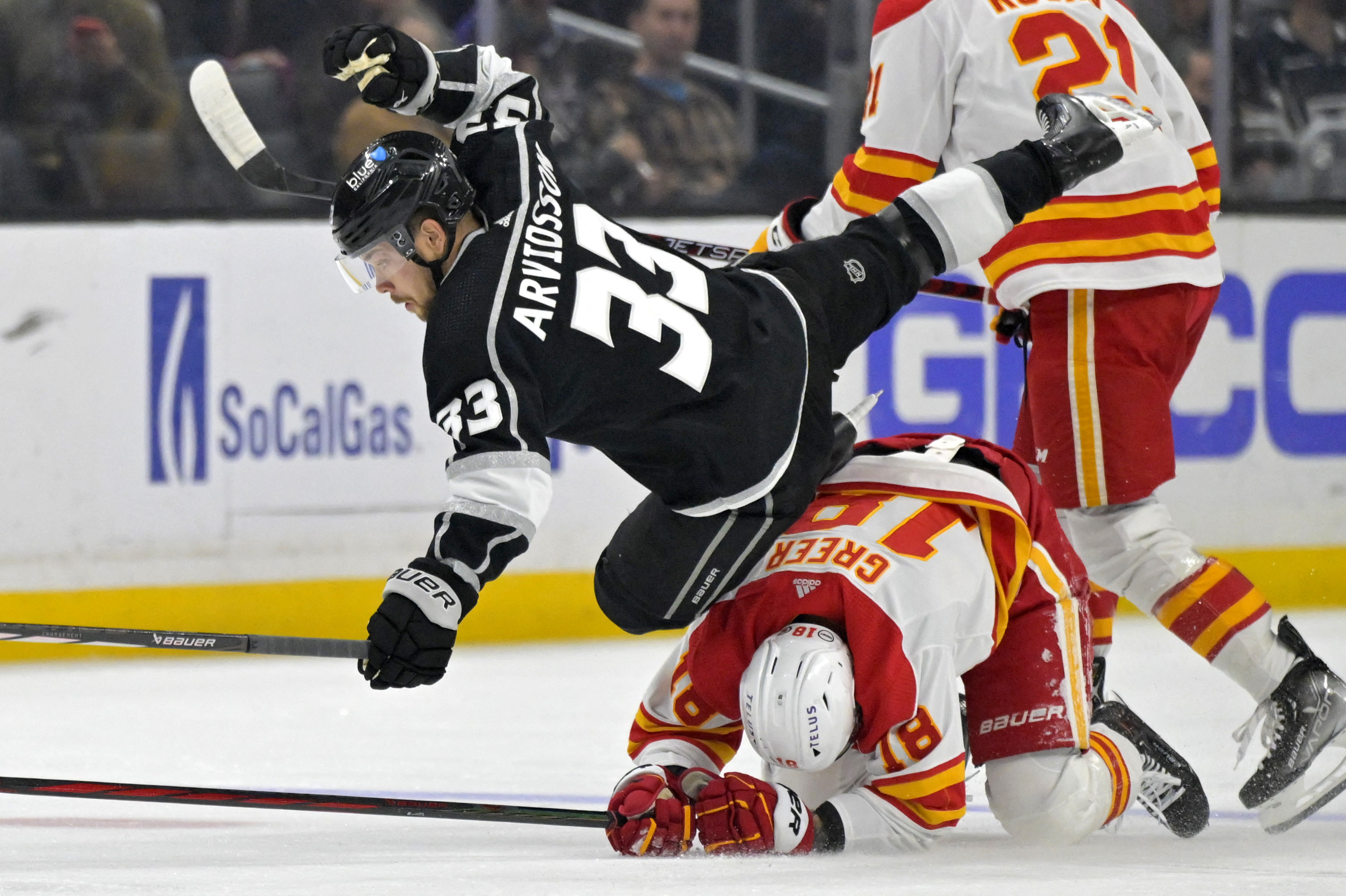 Kings wrap up playoff berth with win over Flames | Reuters