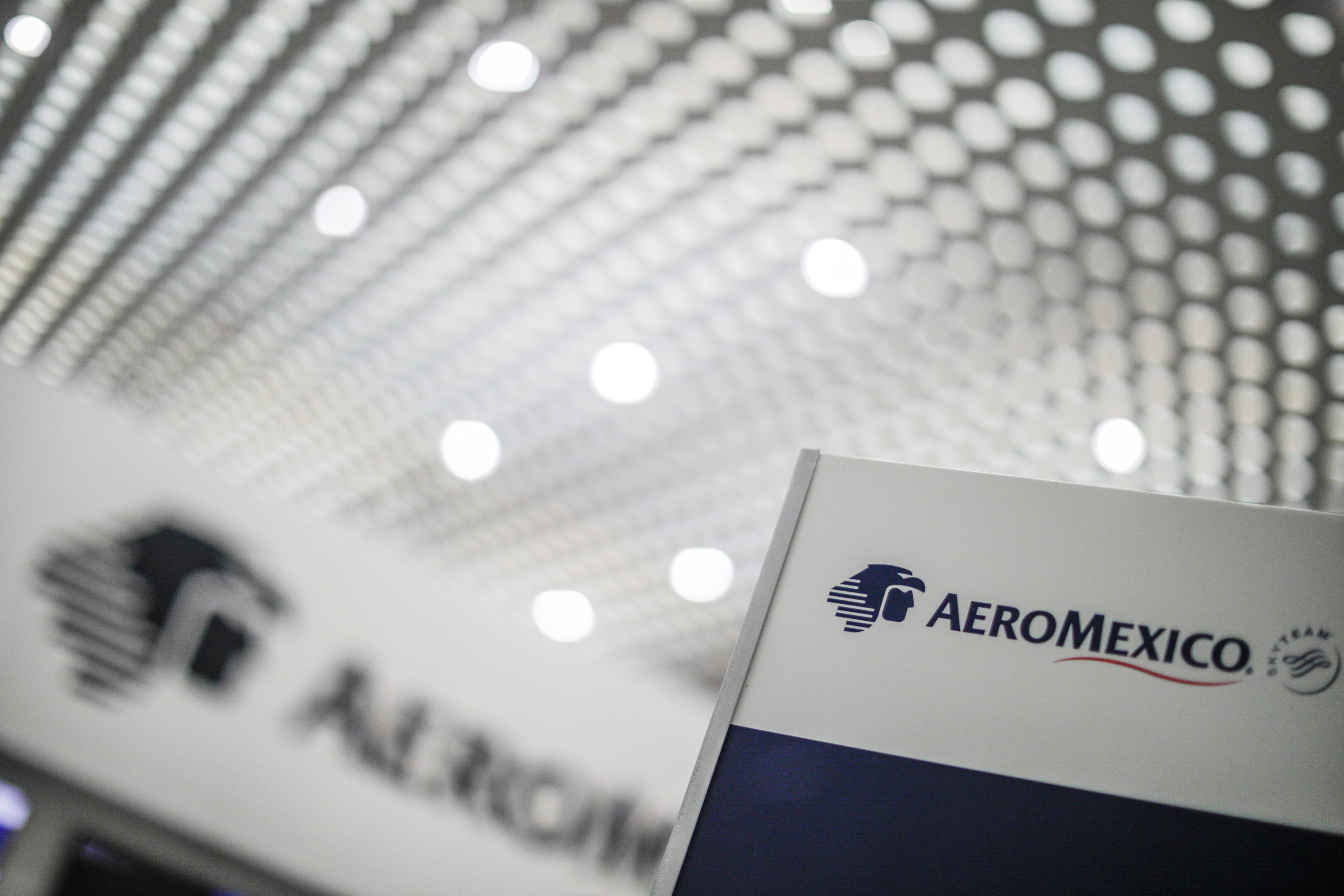 The logo of Mexican airline Aeromexico is pictured on a sign at the Benito Juarez International airport in Mexico City