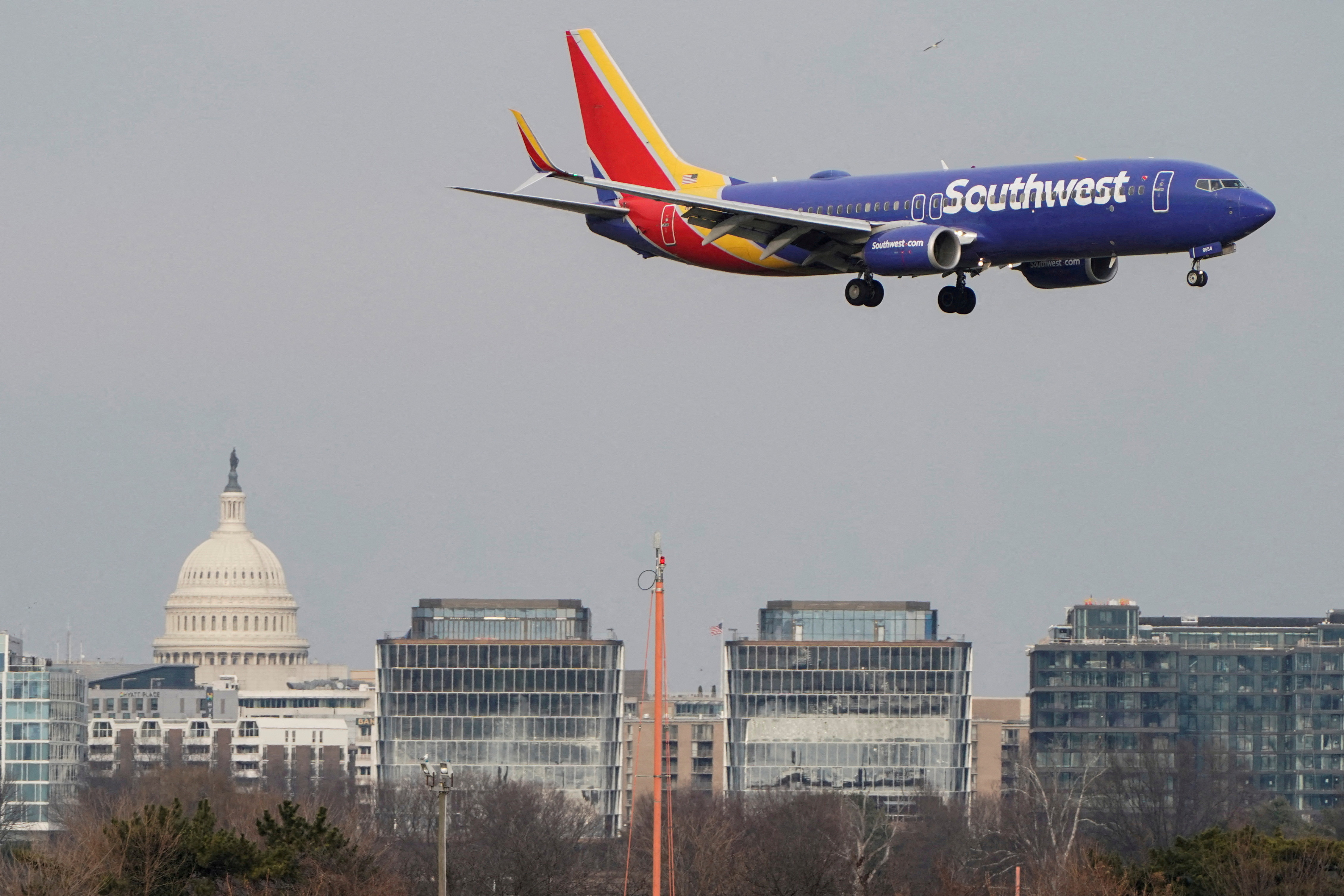 A Southwest Airlines aircraft lands at Reagan National Airport in Arlington, Virginia
