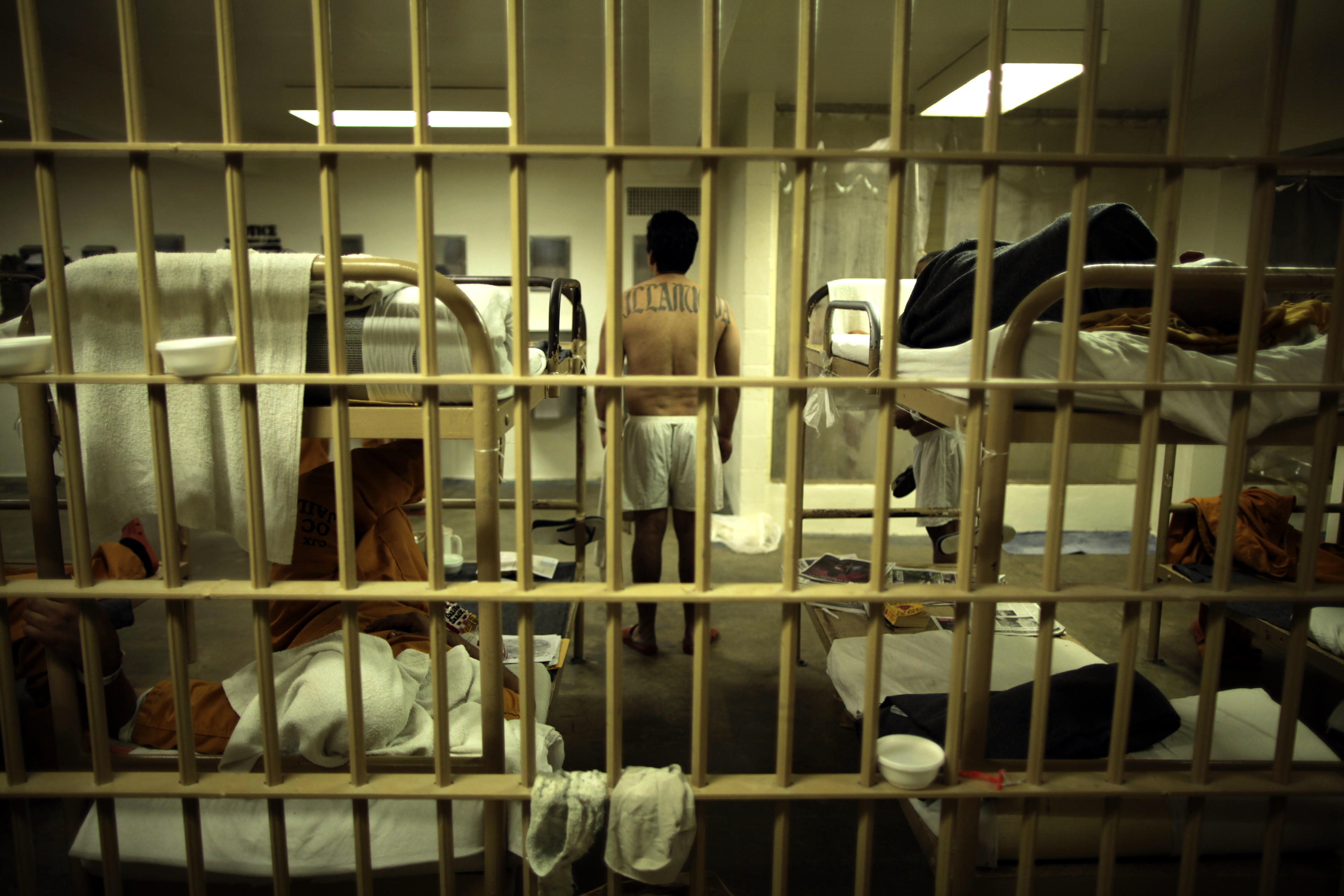 An inmate stands in his cell at the Orange County jail in Santa Ana