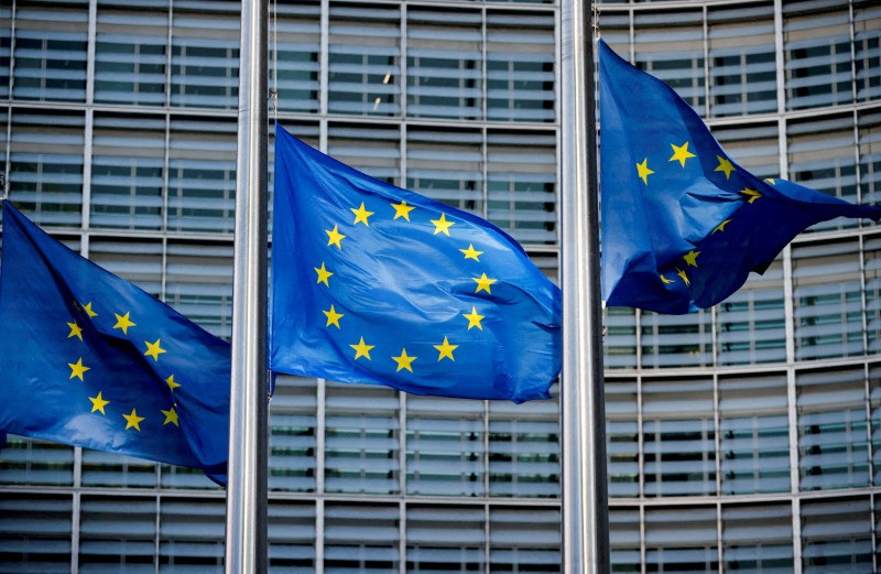 European Union flags fly outside the European Commission headquarters in Brussels