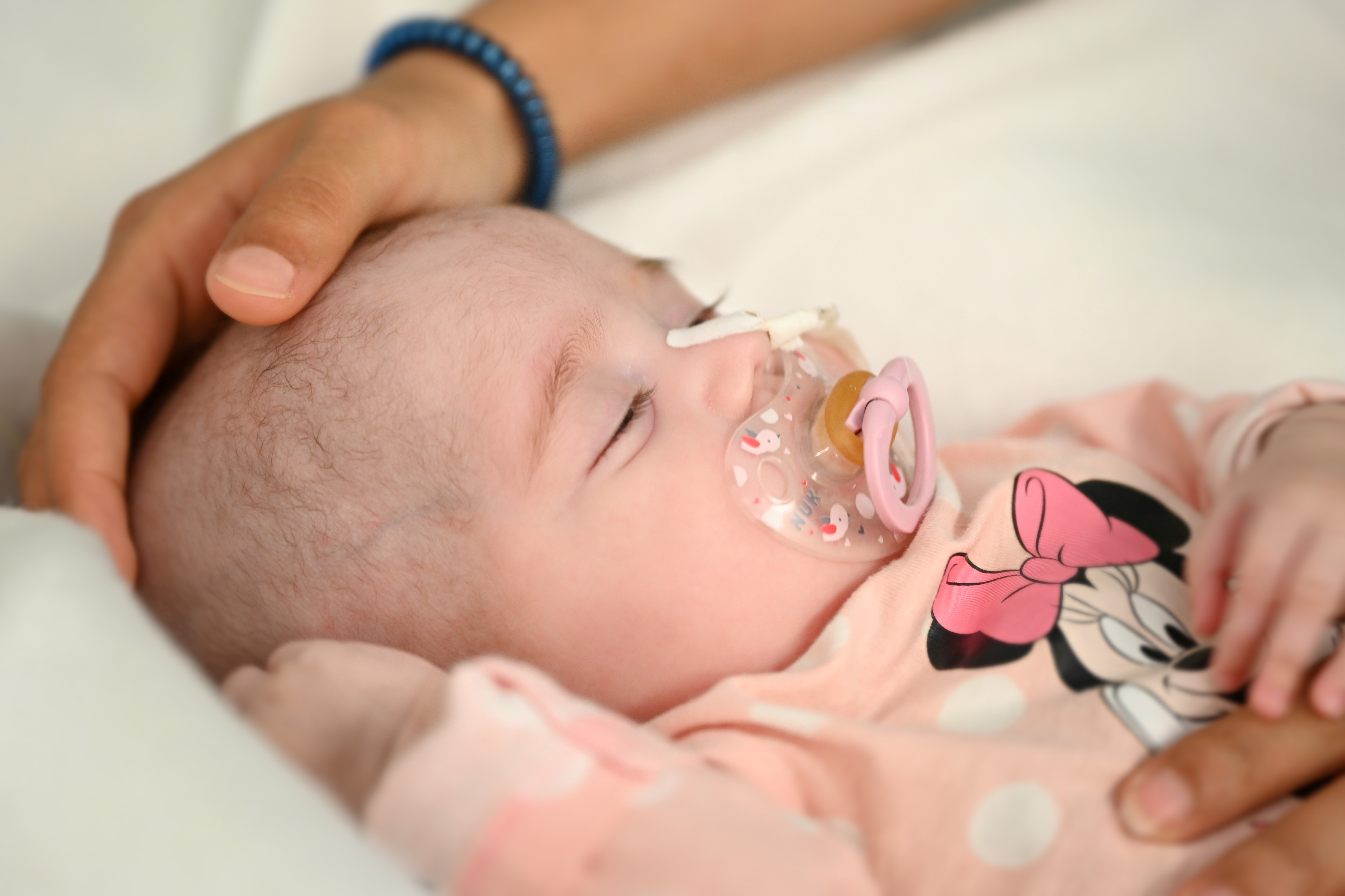 Two-month old Spanish baby girl Naiara, who received a heart transplant in a pioneering surgery, is seen in this handout picture released by Gregorio Maranon Hospital in Madrid