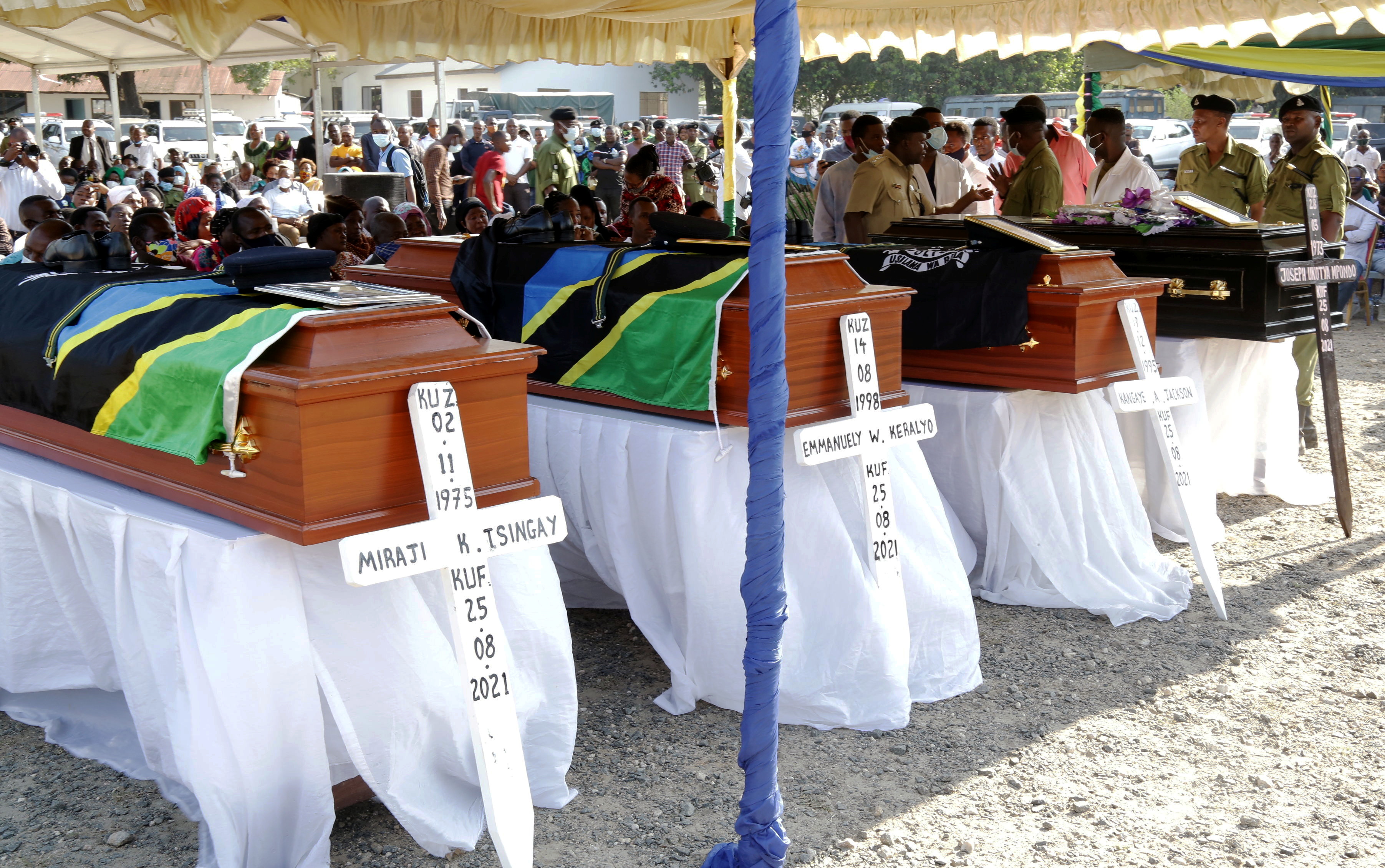 Coffins containing the bodies of policemen killed by an attacker near the French Embassy, during their farewell ceremony in Dar es Salaam