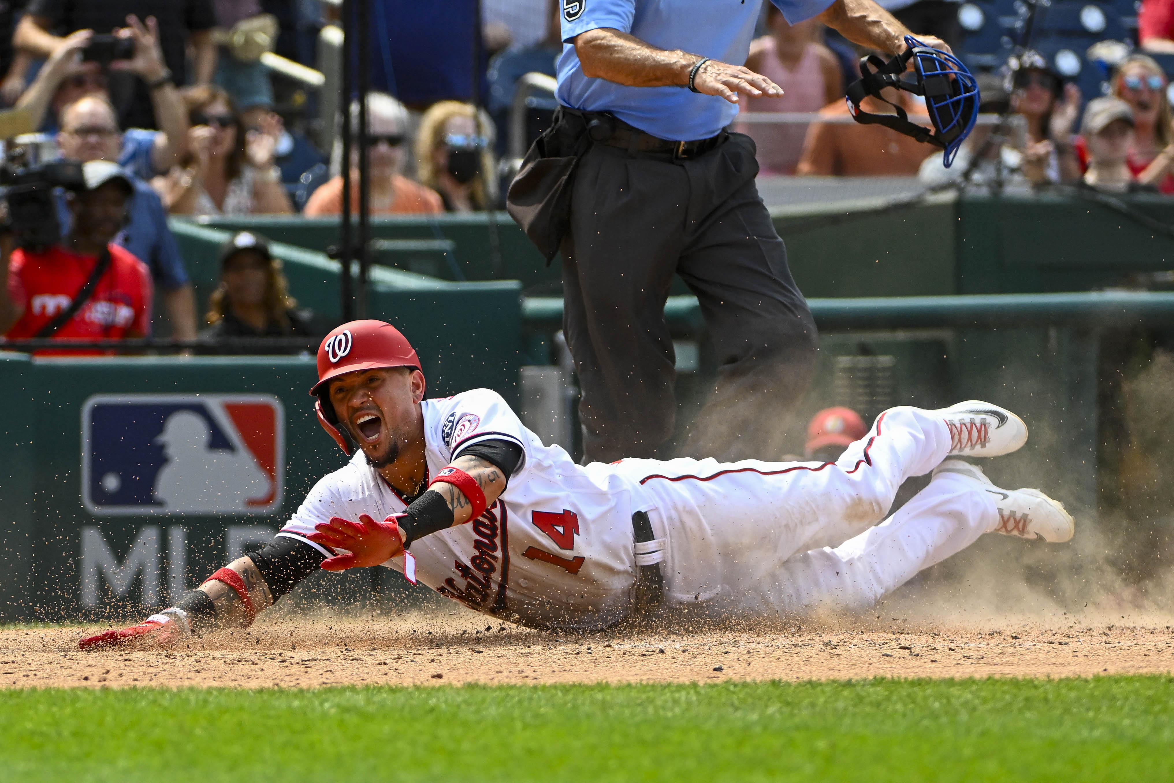 Nationals get help pulling off late rally vs. Brewers