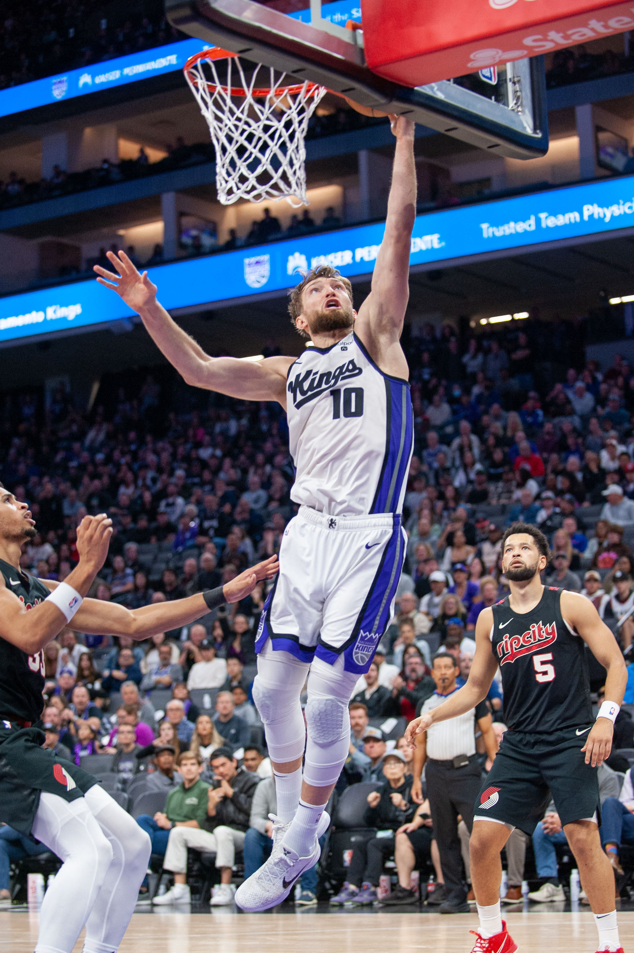 Kings tie game with late spurt, edge Blazers in OT