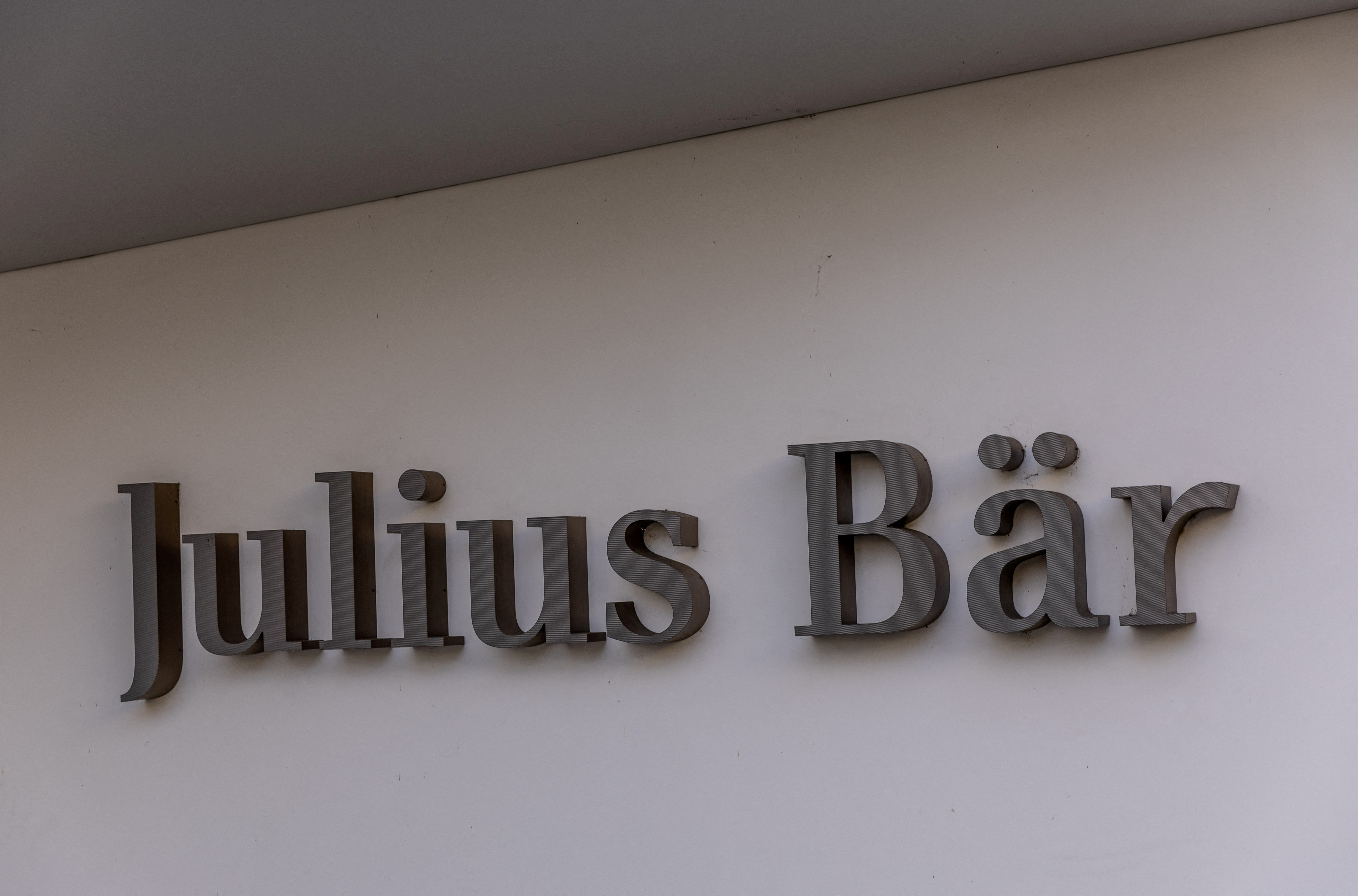 A logo is pictured on the branch of Swiss private bank Julius Baer in Lausanne