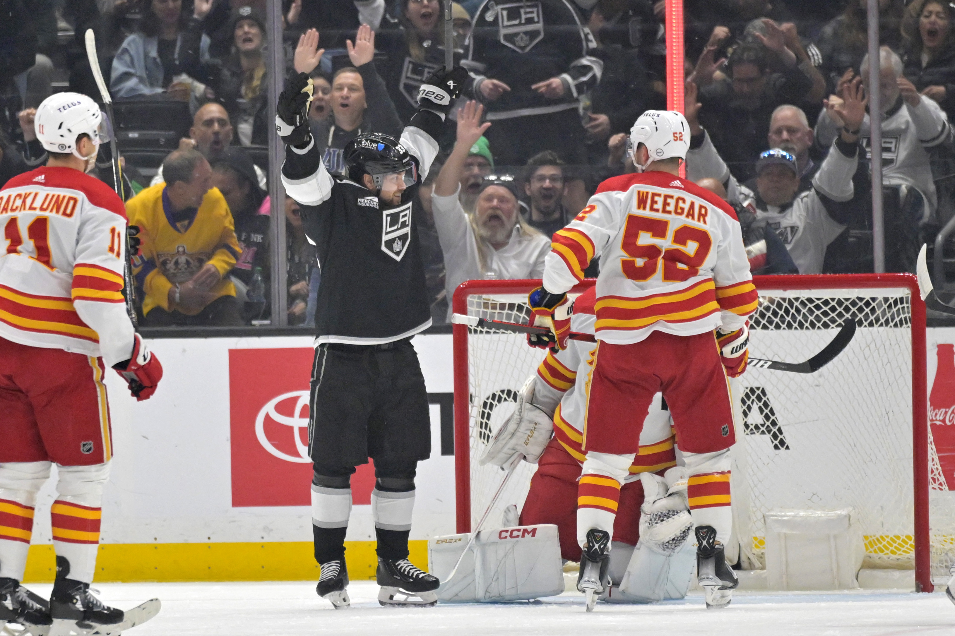 Kings wrap up playoff berth with win over Flames | Reuters