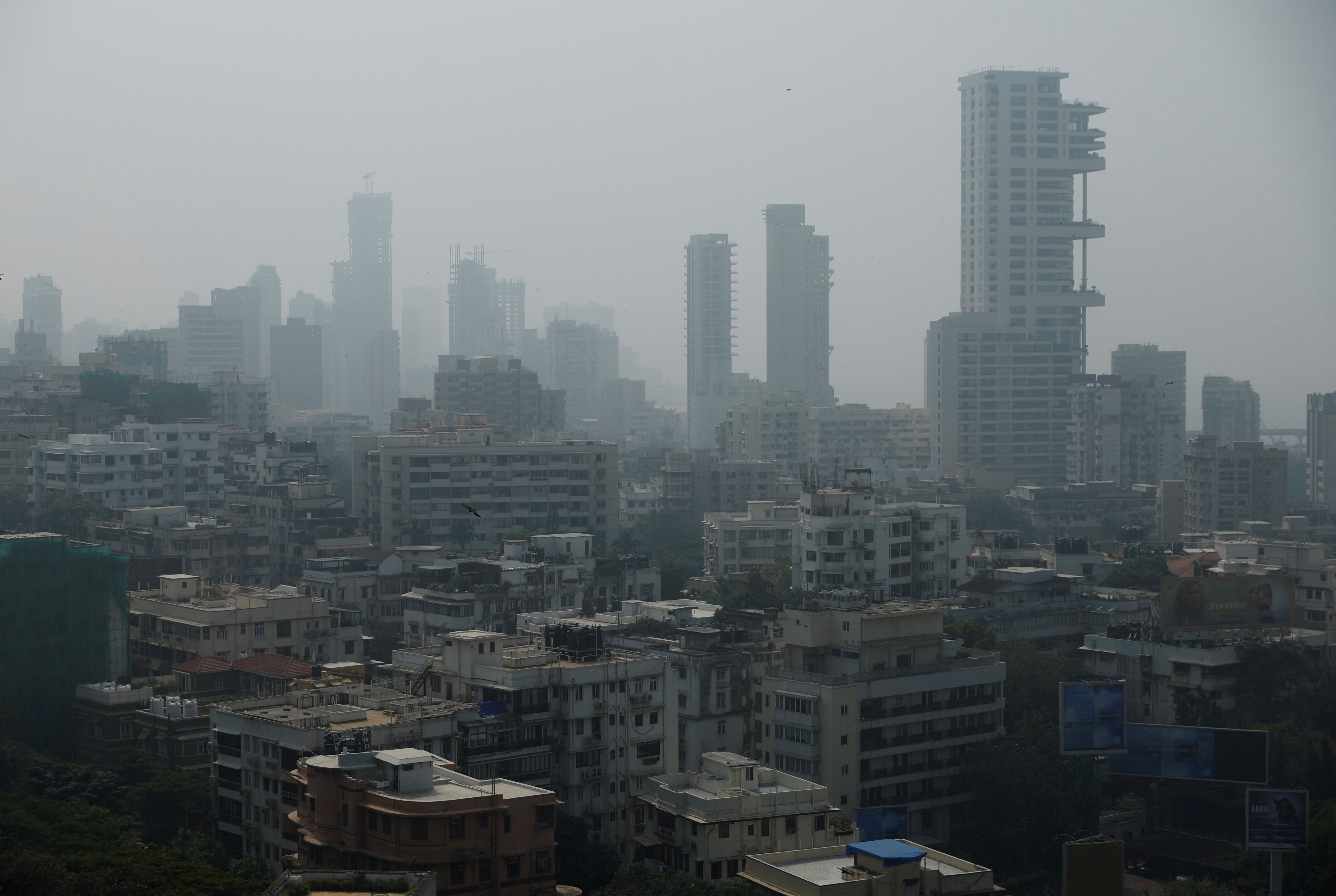 A general view of high-rise residential buildings amidst other residential buildings in Mumbai