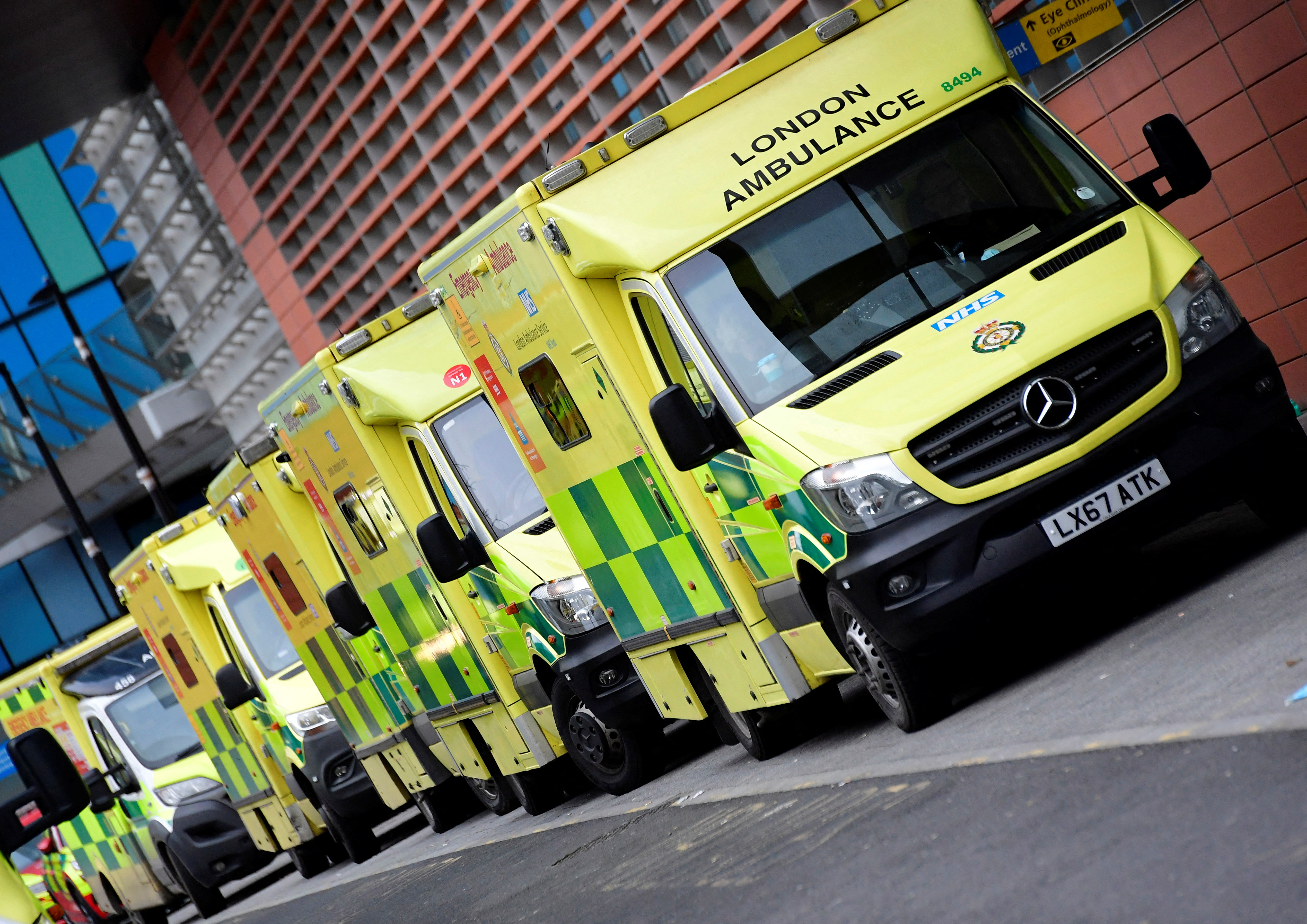 Ambulances parked amid the COVID-19 pandemic outside the Royal London Hospital in London