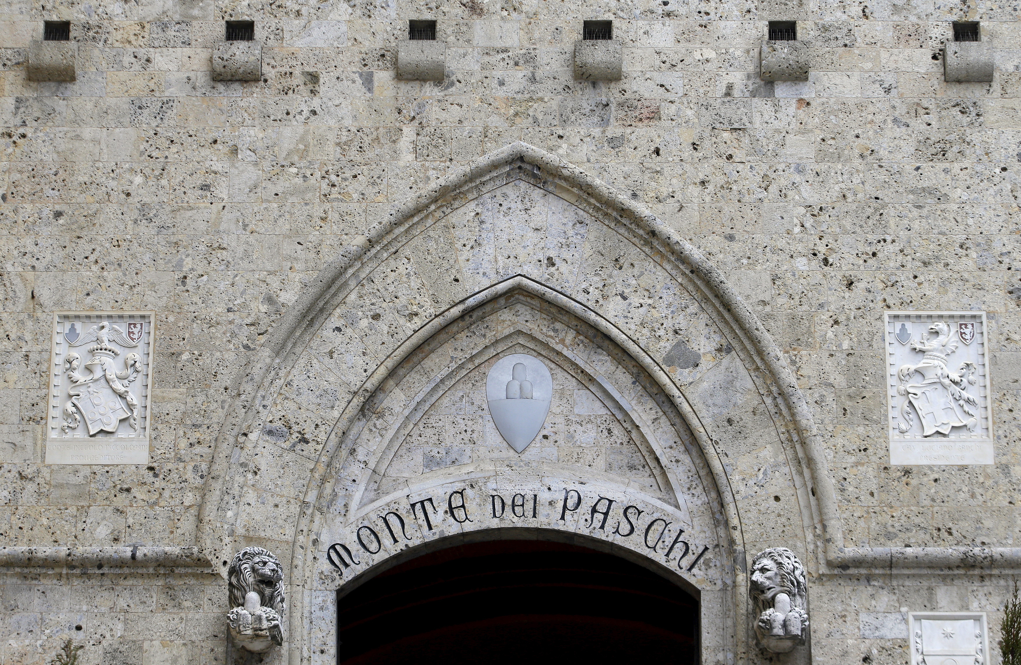 The entrance of the Monte dei Paschi bank headquarters is seen in Siena