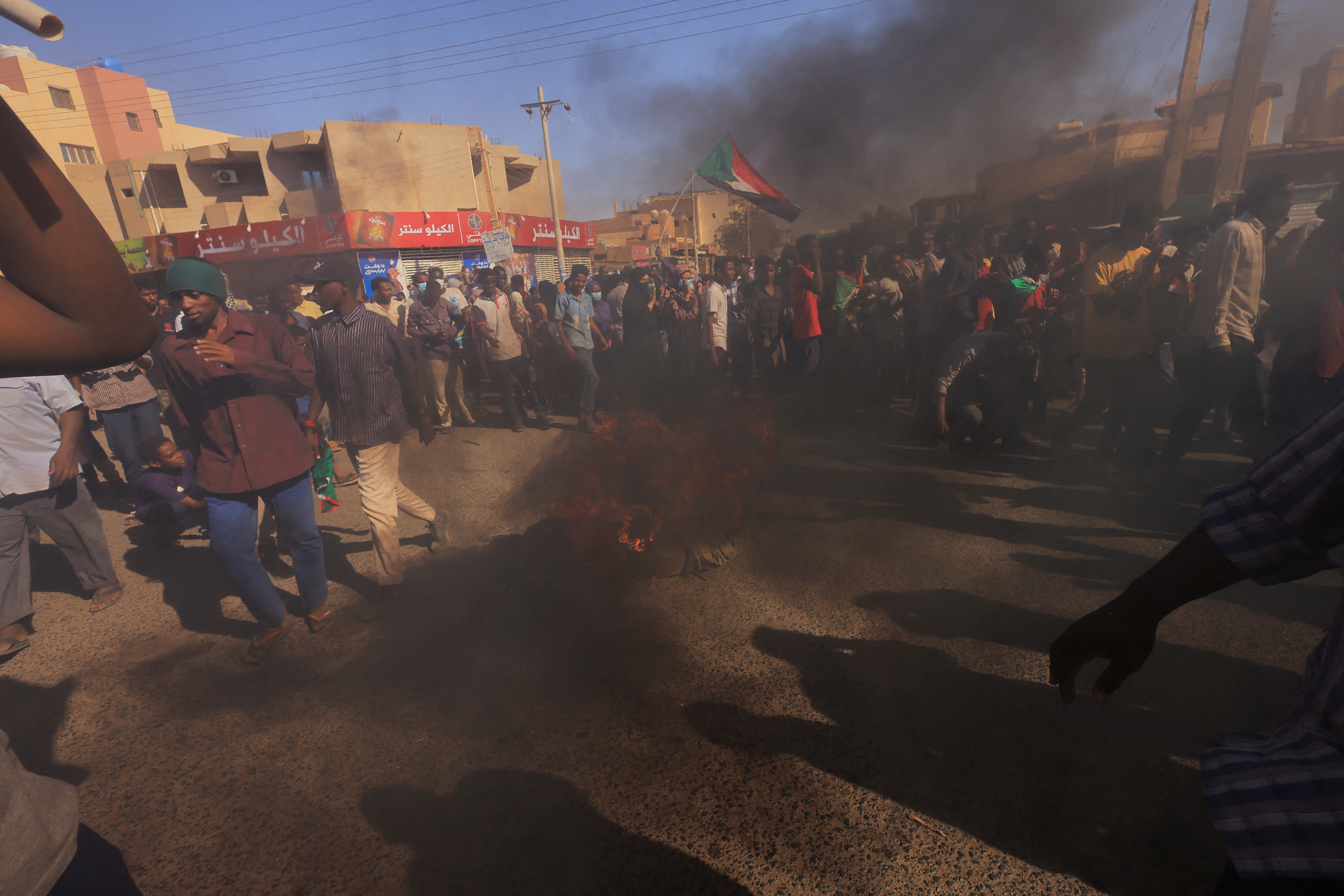 People attends a protest rally in Khartoum
