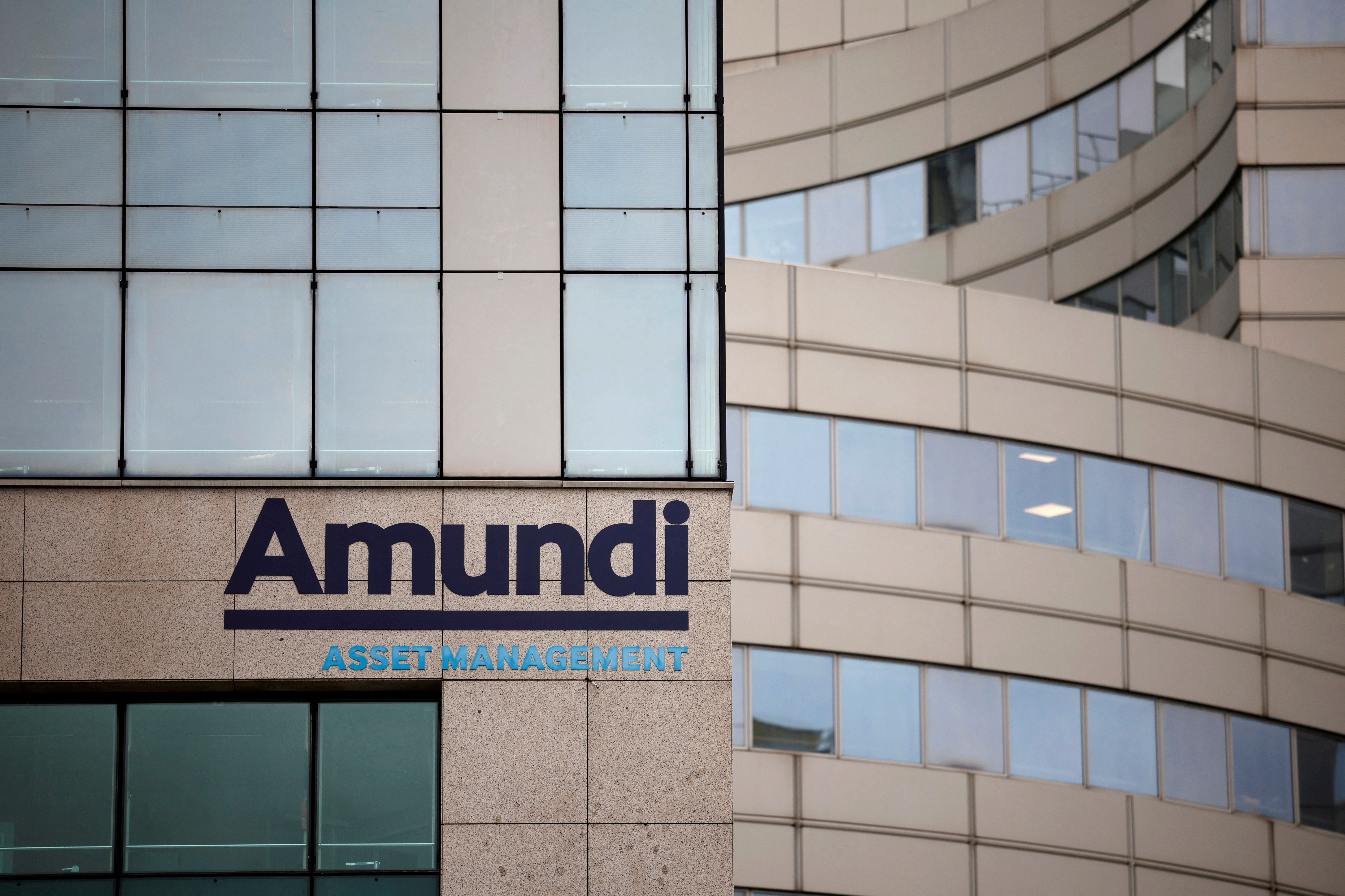Logo of Amundi oustide the company headquarters in Paris