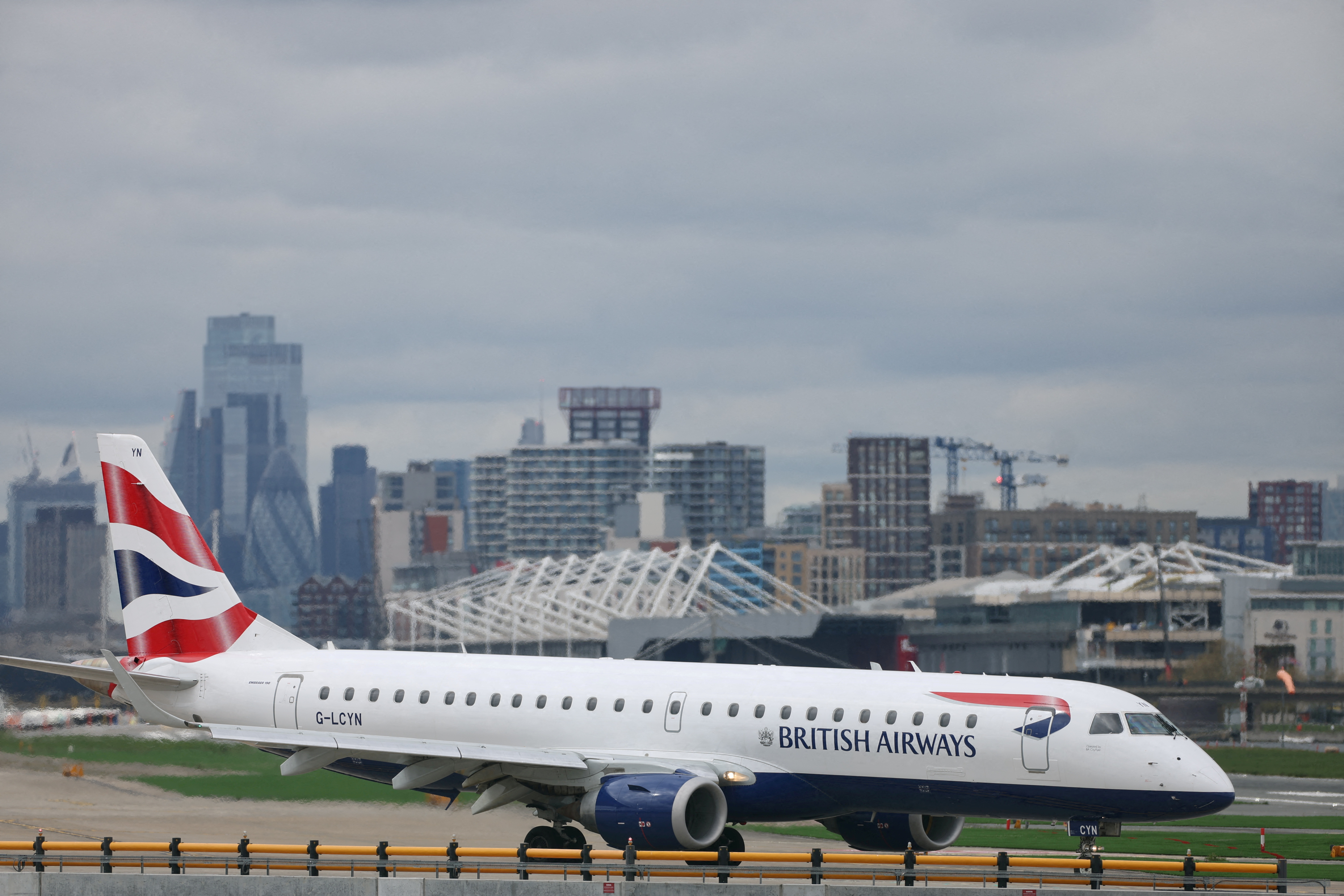 A British Airways  Embraer ERJ-190SR takes off from London City Airport