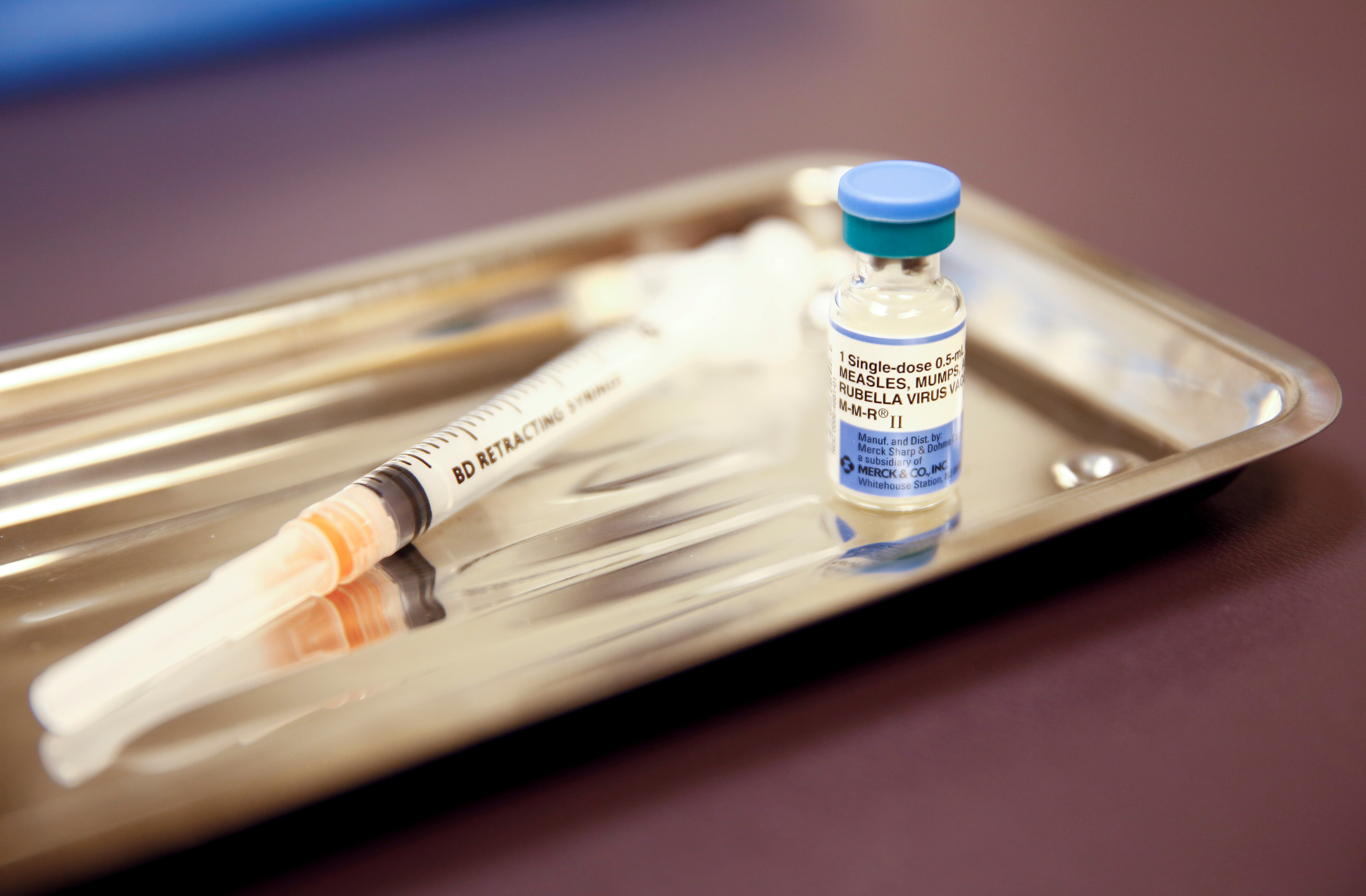 A vial of the measles, mumps, and rubella (MMR) vaccine is pictured at the International Community Health Services clinic in Seattle