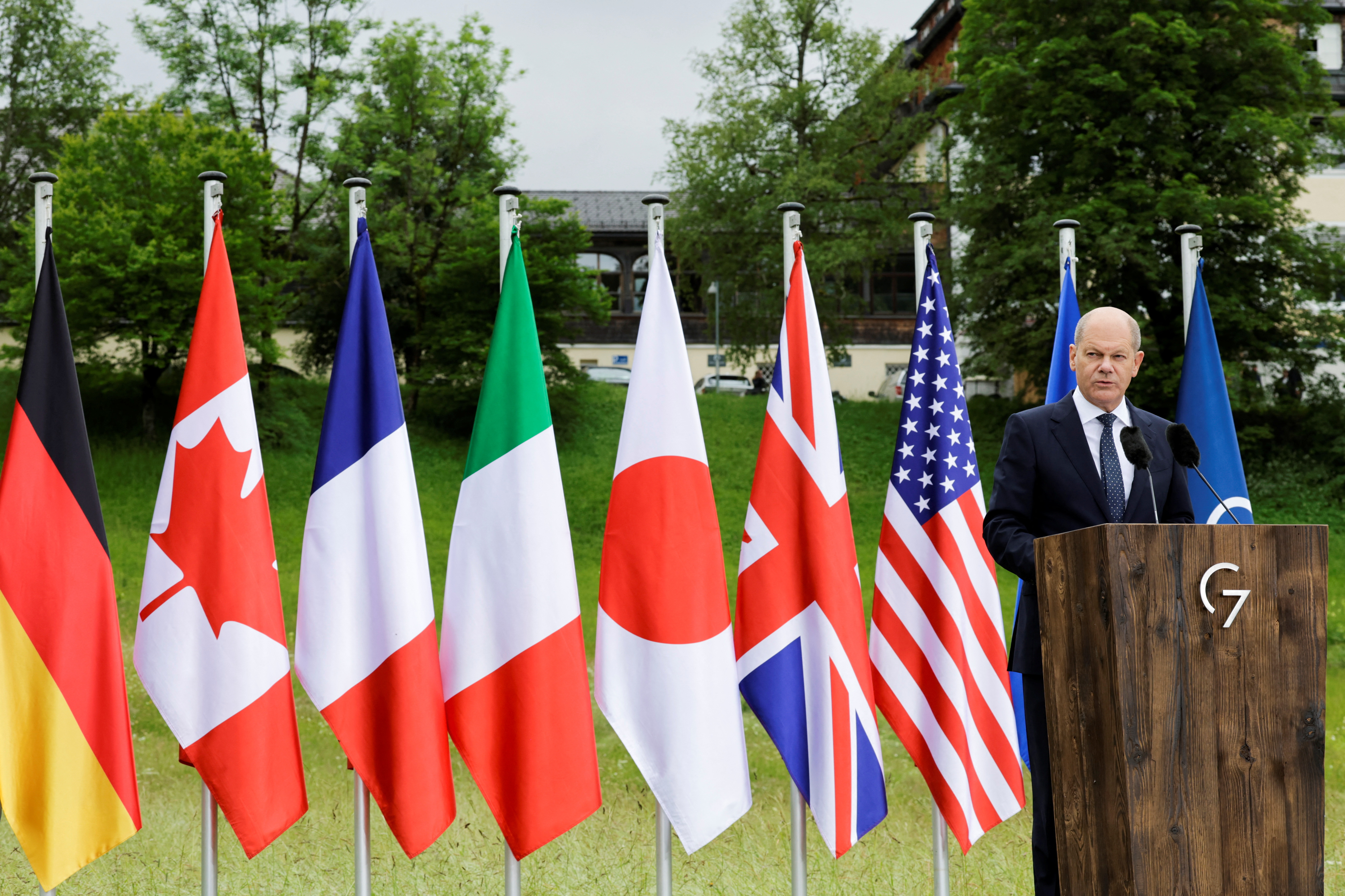 German Chancellor Olaf Scholz addresses the media following the G7 summit