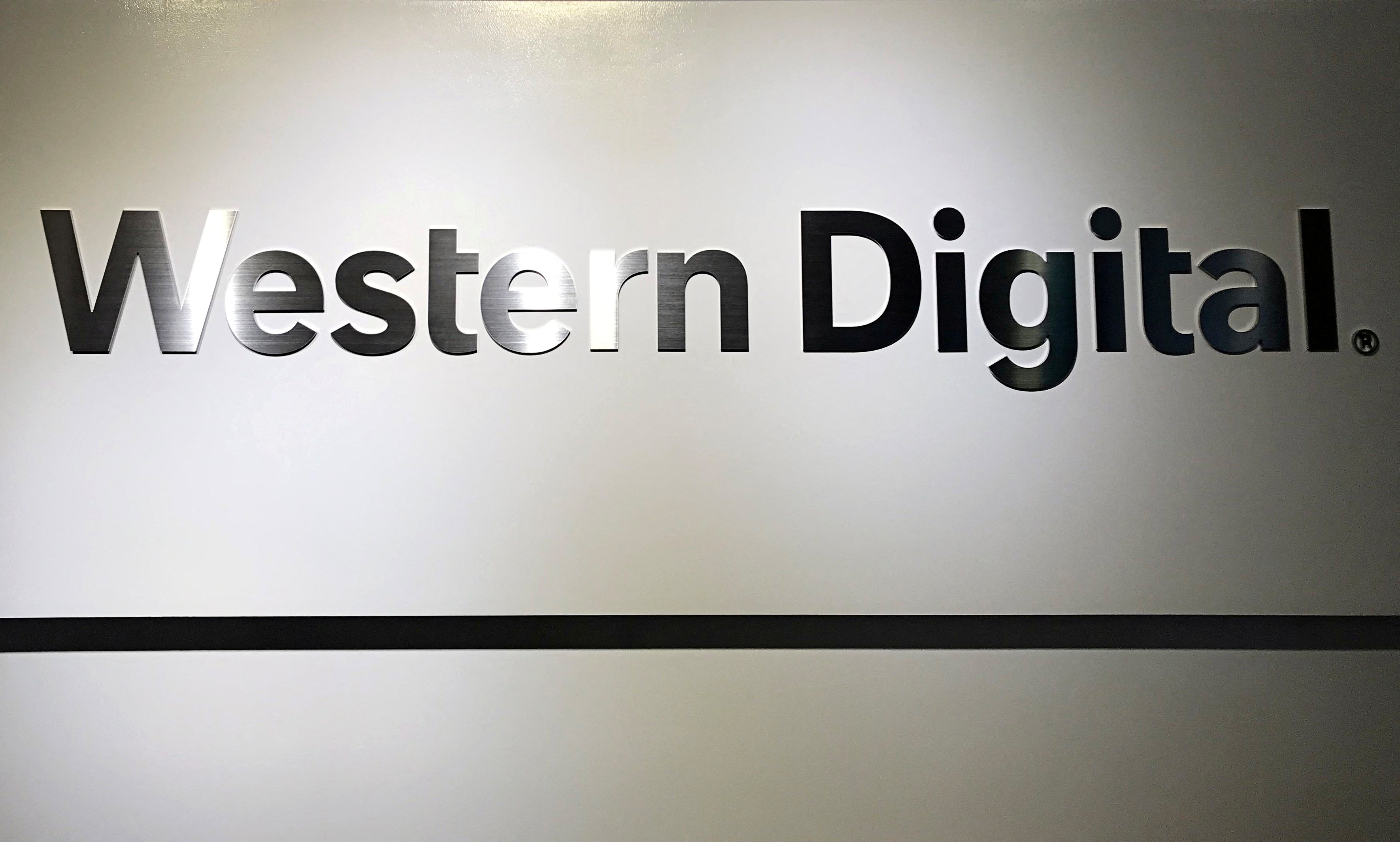The logo of Western Digital Corporation is displayed at the company's headquarters in Tokyo