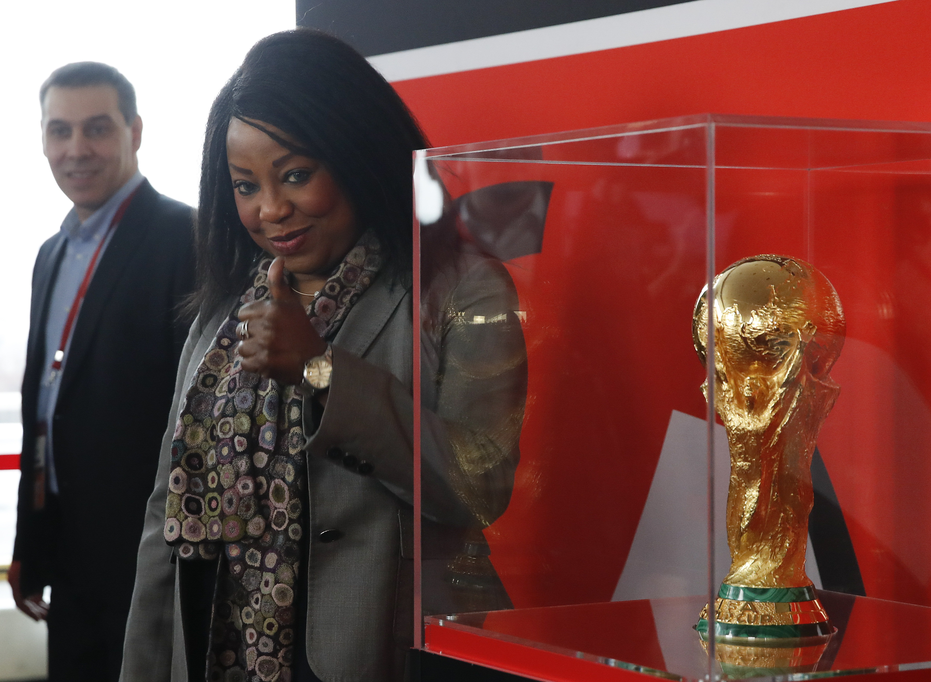 FIFA Secretary General Fatma Samoura gestures near the World Cup trophy during a demonstration in Moscow
