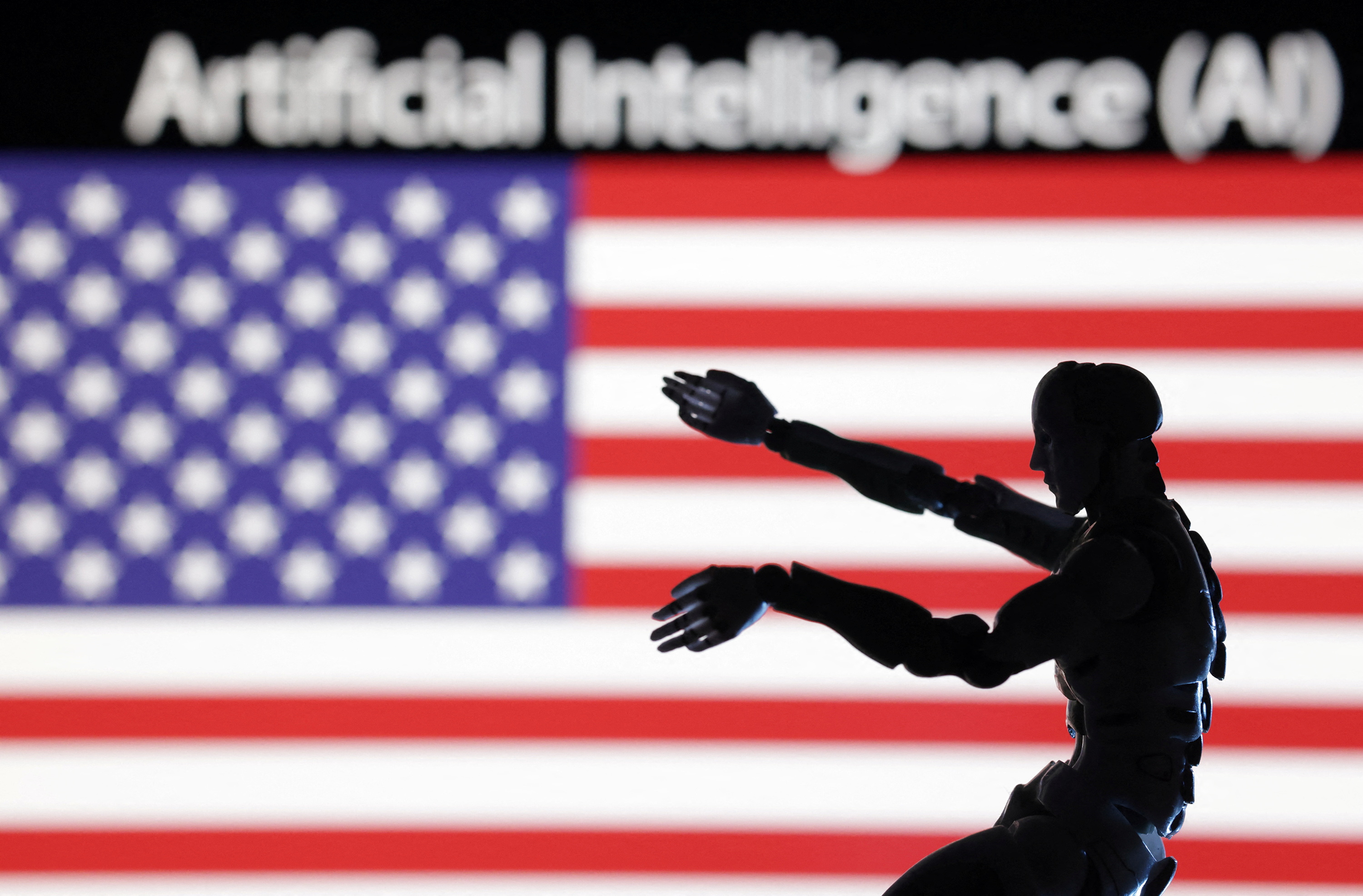 Illustration shows AI Artificial intelligence words, miniature of robot and U.S. flag