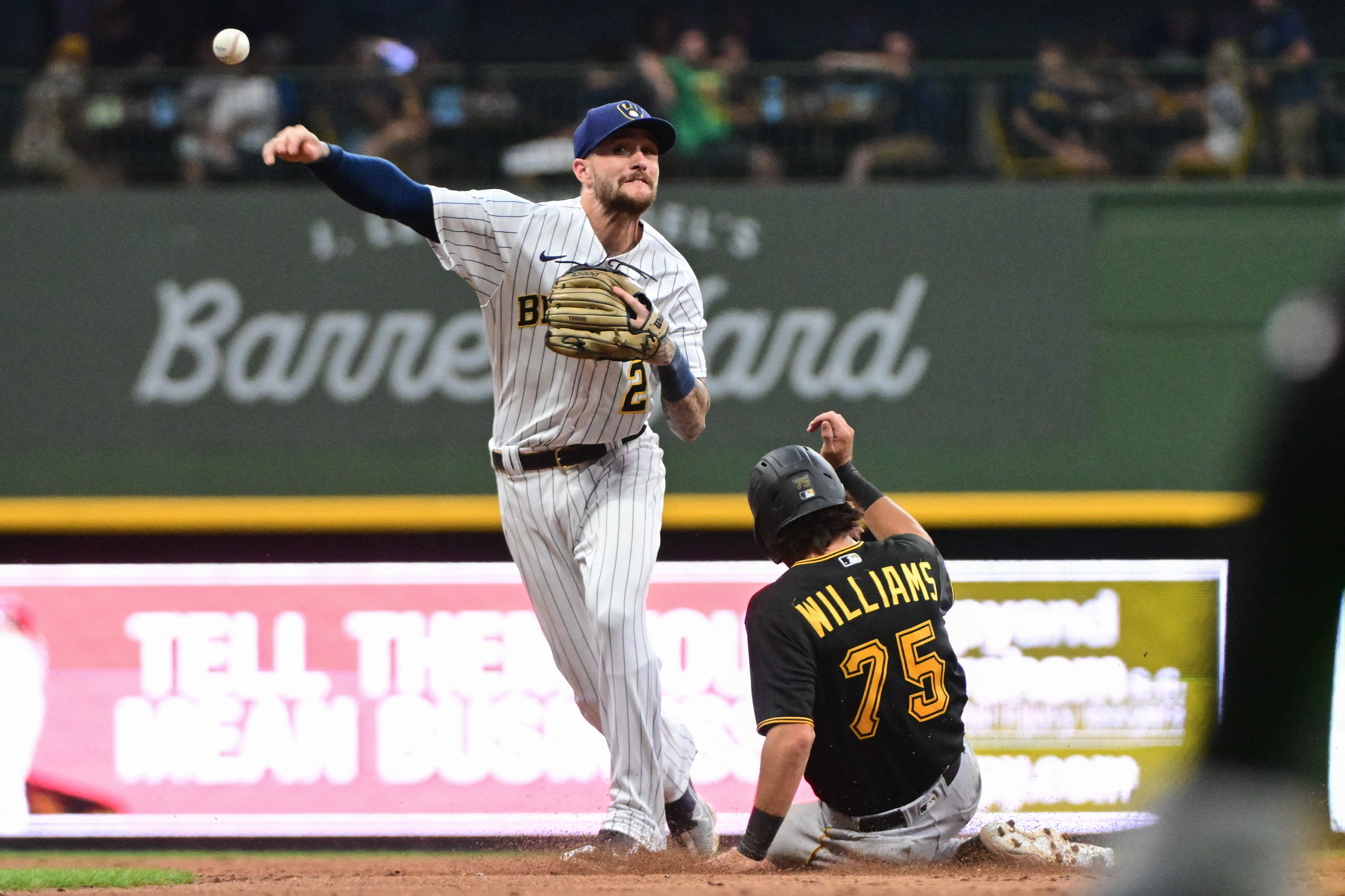 Brewers catch Pirates in 9th, beat them in 10th