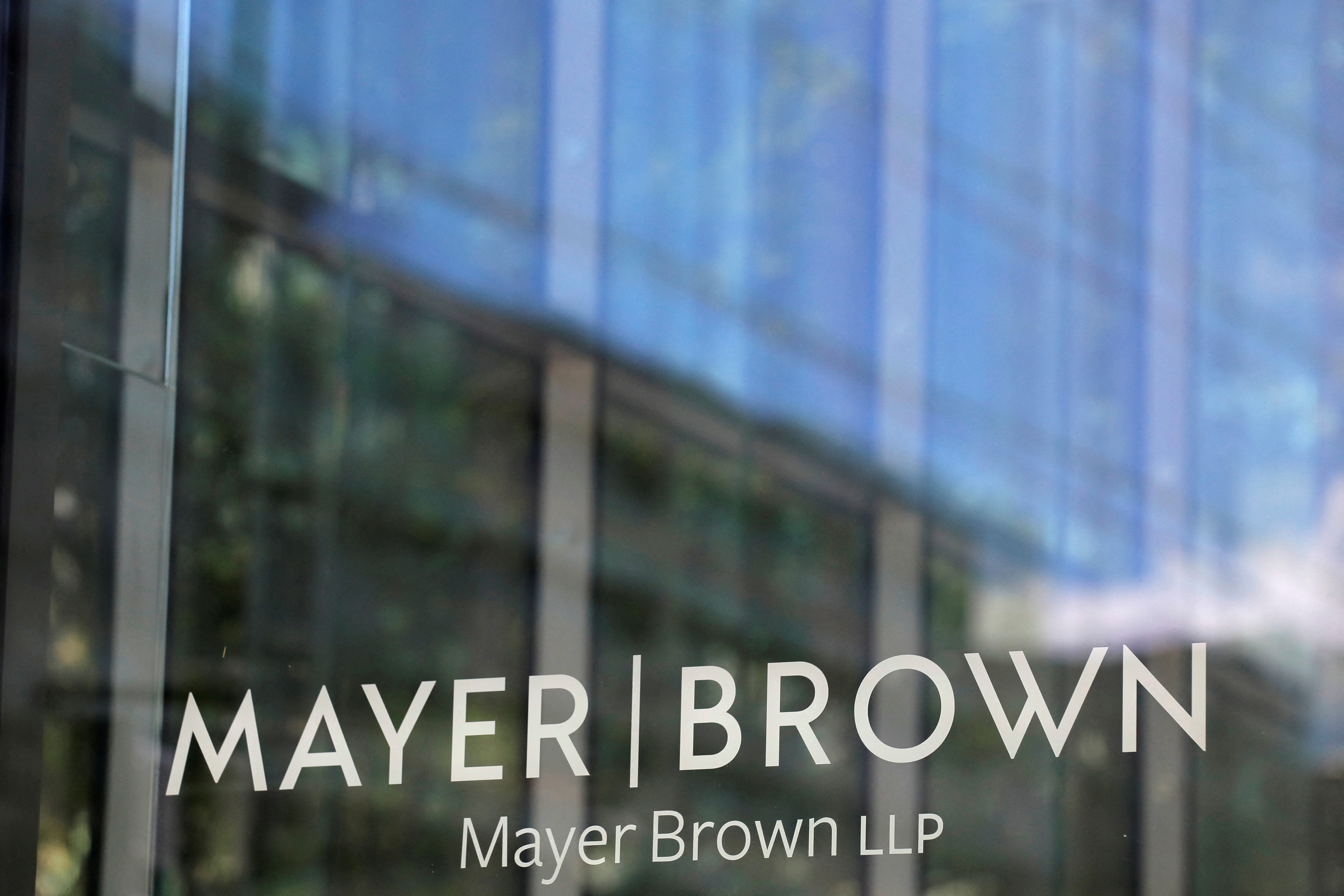 Signage is seen outside of the law firm Mayer Brown LLP in Washington, D.C.