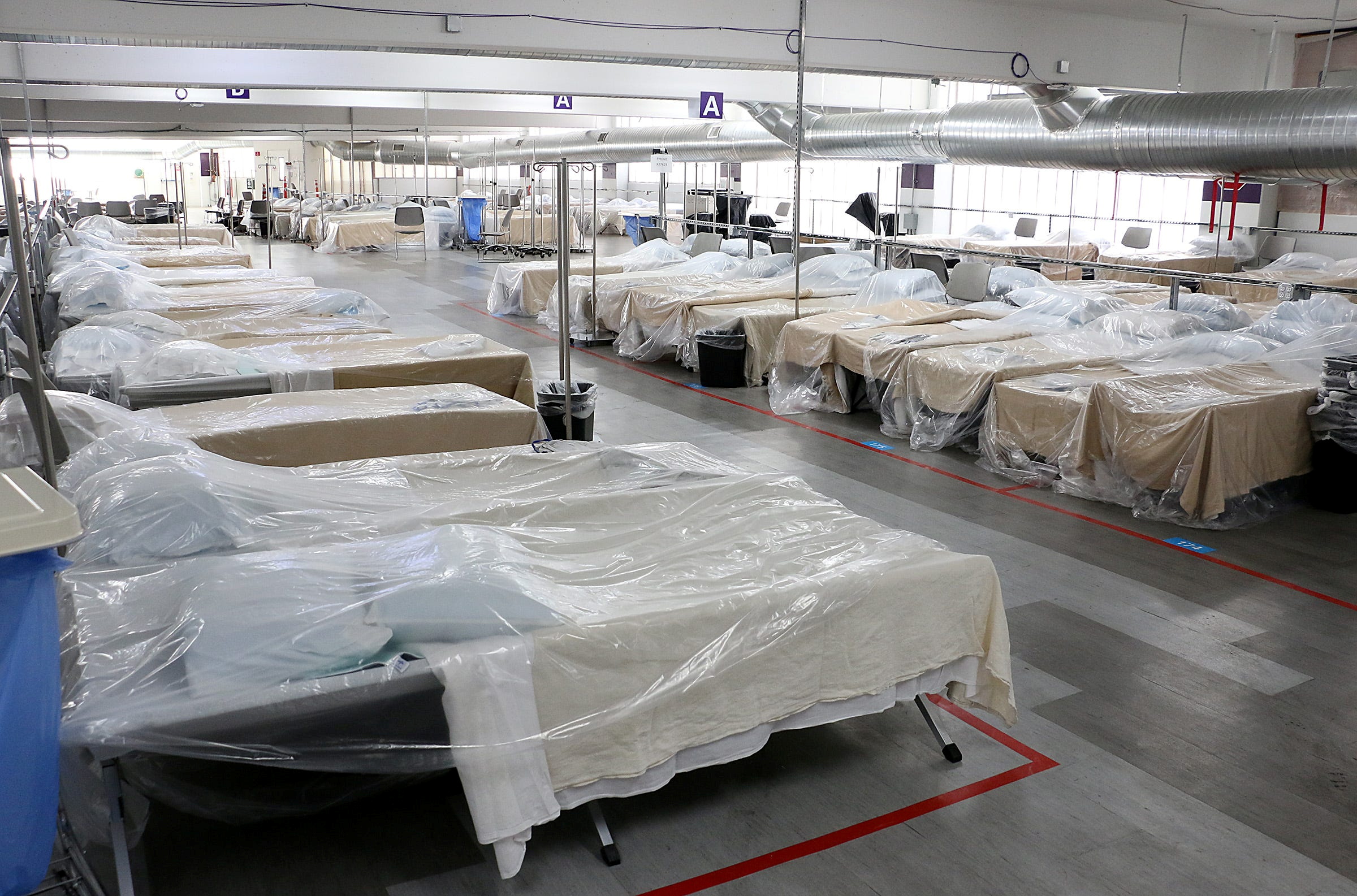 Back-up hospital beds are seen in the parking garage at the Renown Regional Medical Center in Reno, Nevada, U.S. November 11, 2020. Picture taken November 11, 2020. Jason Bean/Reno Gazette Journal/USA Today via REUTERS  THIS IMAGE HAS BEEN SUPPLIED BY A THIRD PARTY.