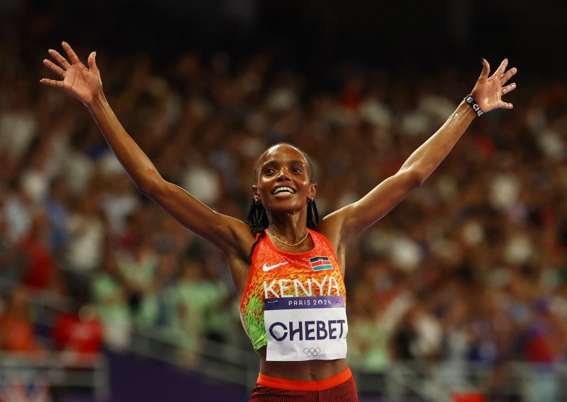 Athletics-Kenya's Chebet completes golden double | Reuters