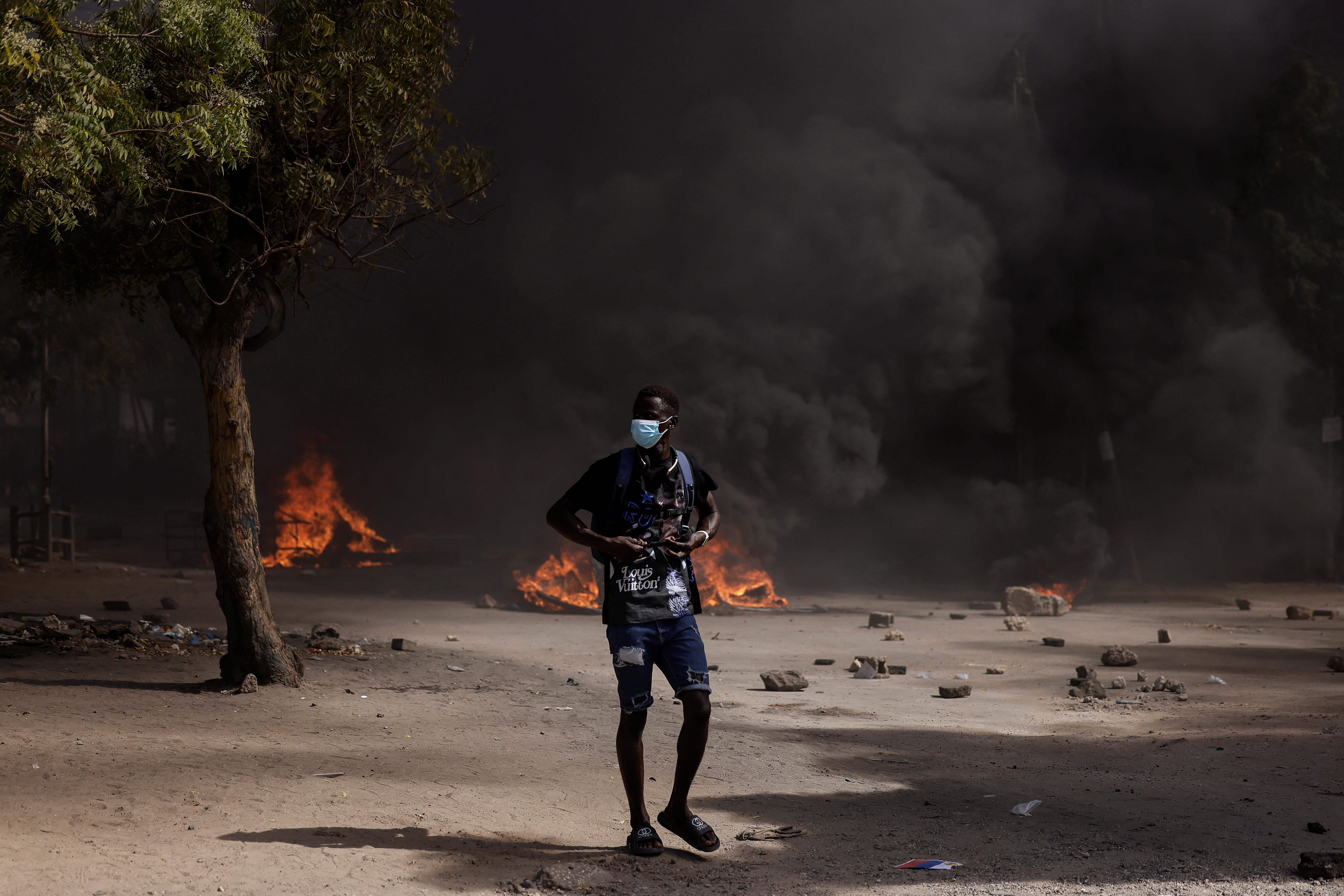 Senegalese demonstrators protest against the postponement of the Feb. 25 presidential election, in Dakar