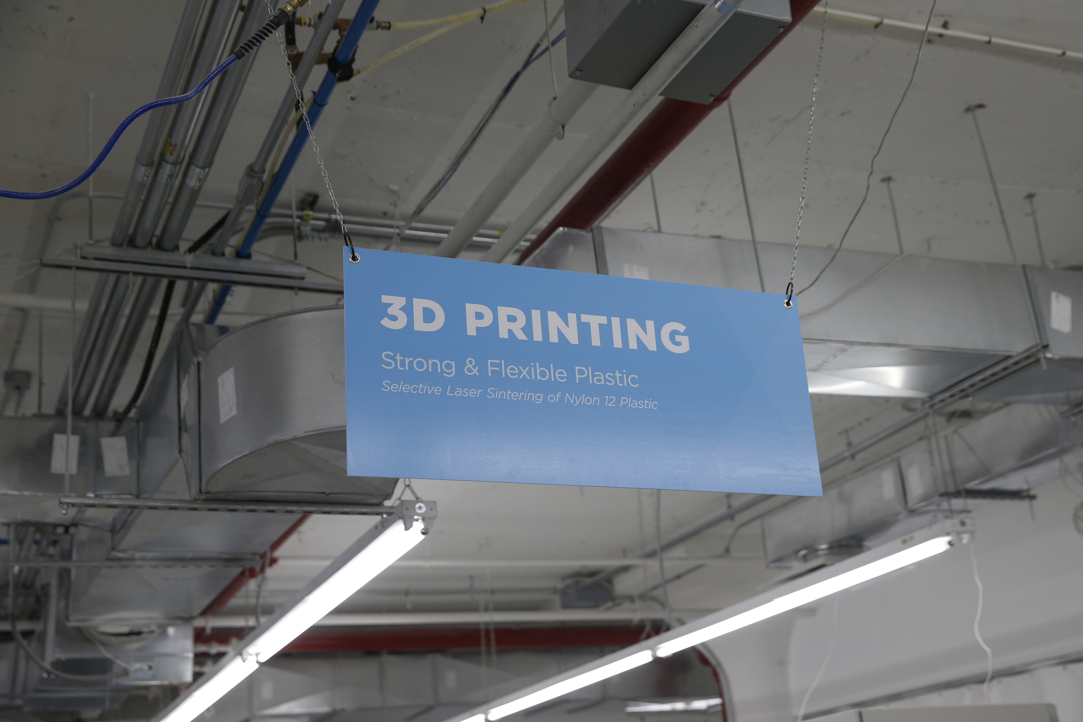 Sign is seen inside the Shapeways 3D printing office in the borough of Queens in New York