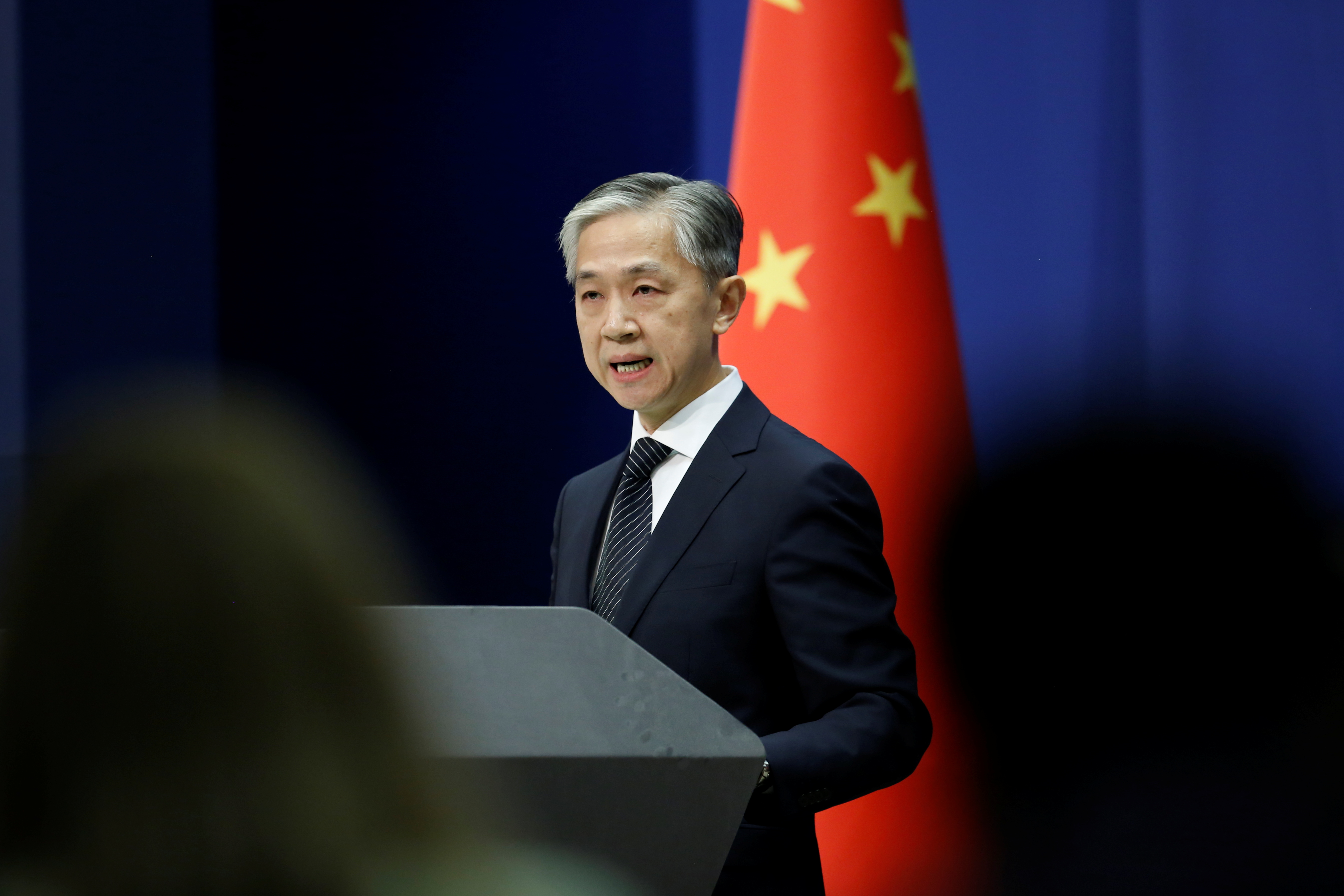 Chinese Foreign Ministry spokesman Wang Wenbin speaks during a news conference in Beijing