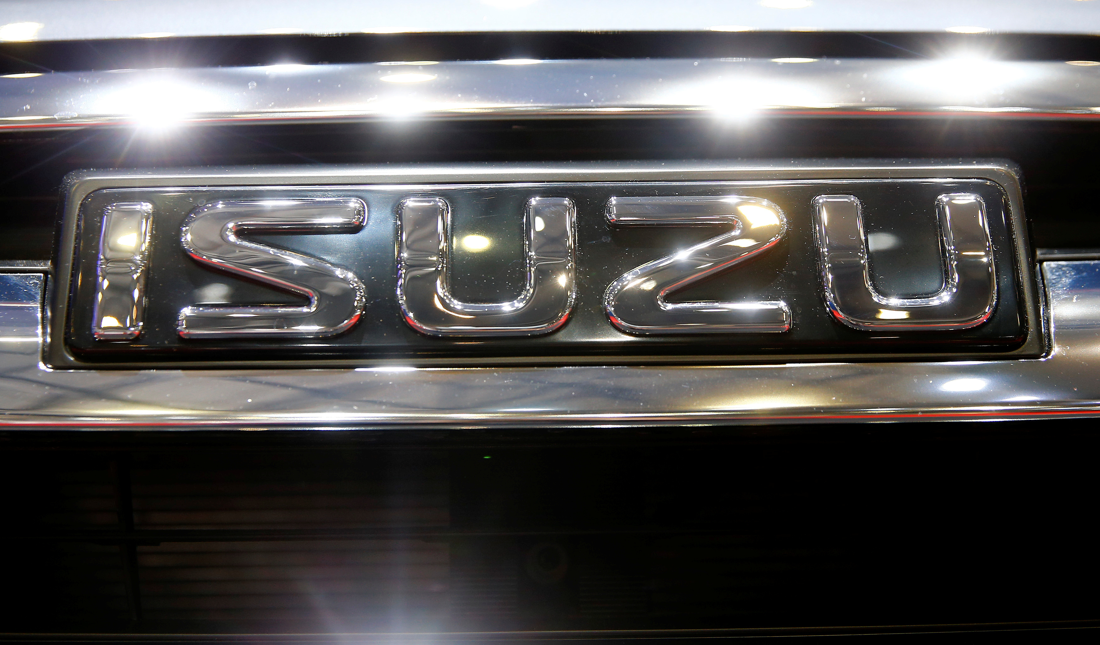 The logo of Isuzu is seen during the 87th International Motor Show at Palexpo in Geneva