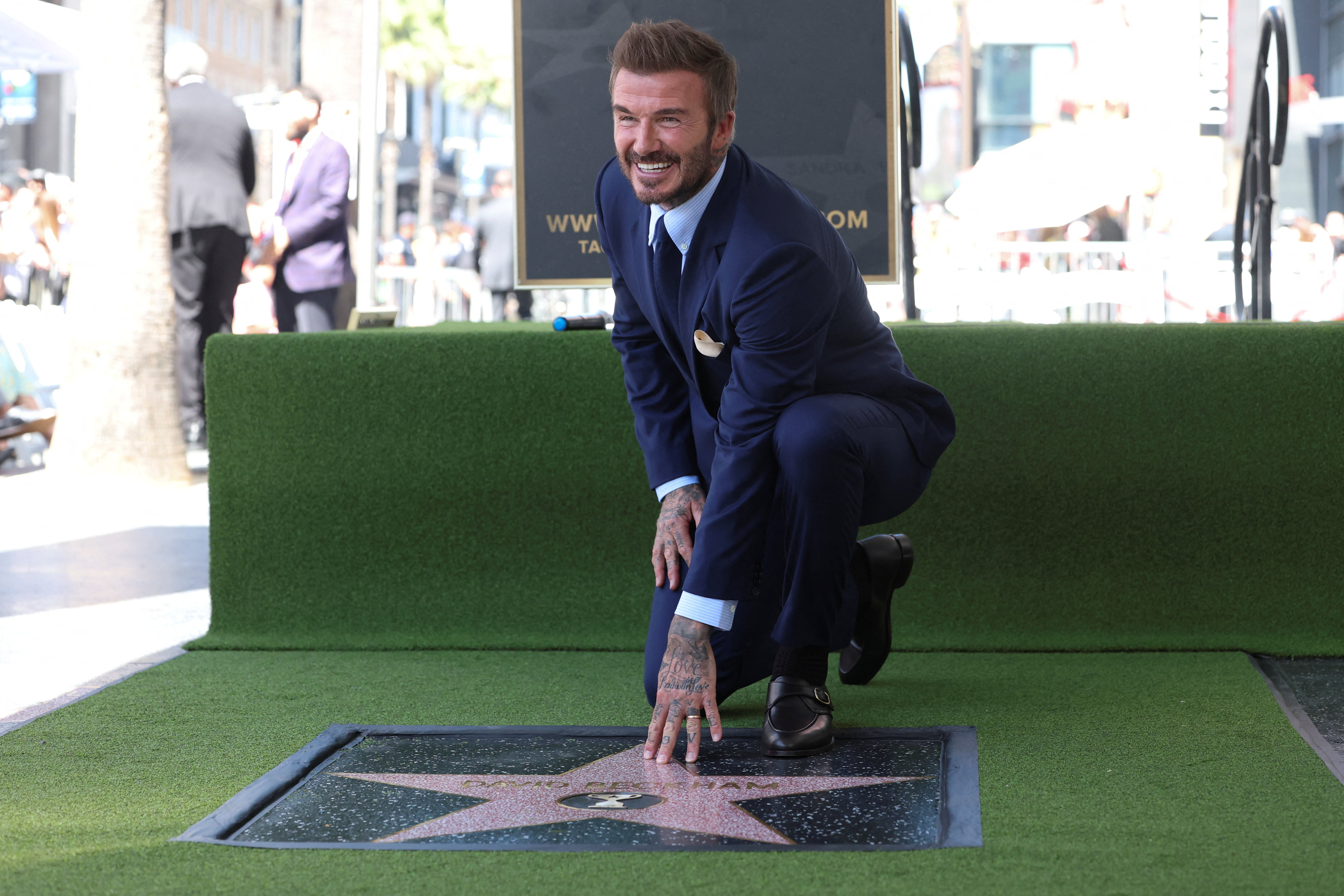 David Beckham honored with Walk of Fame star as LA hosts World Cup games |  Reuters