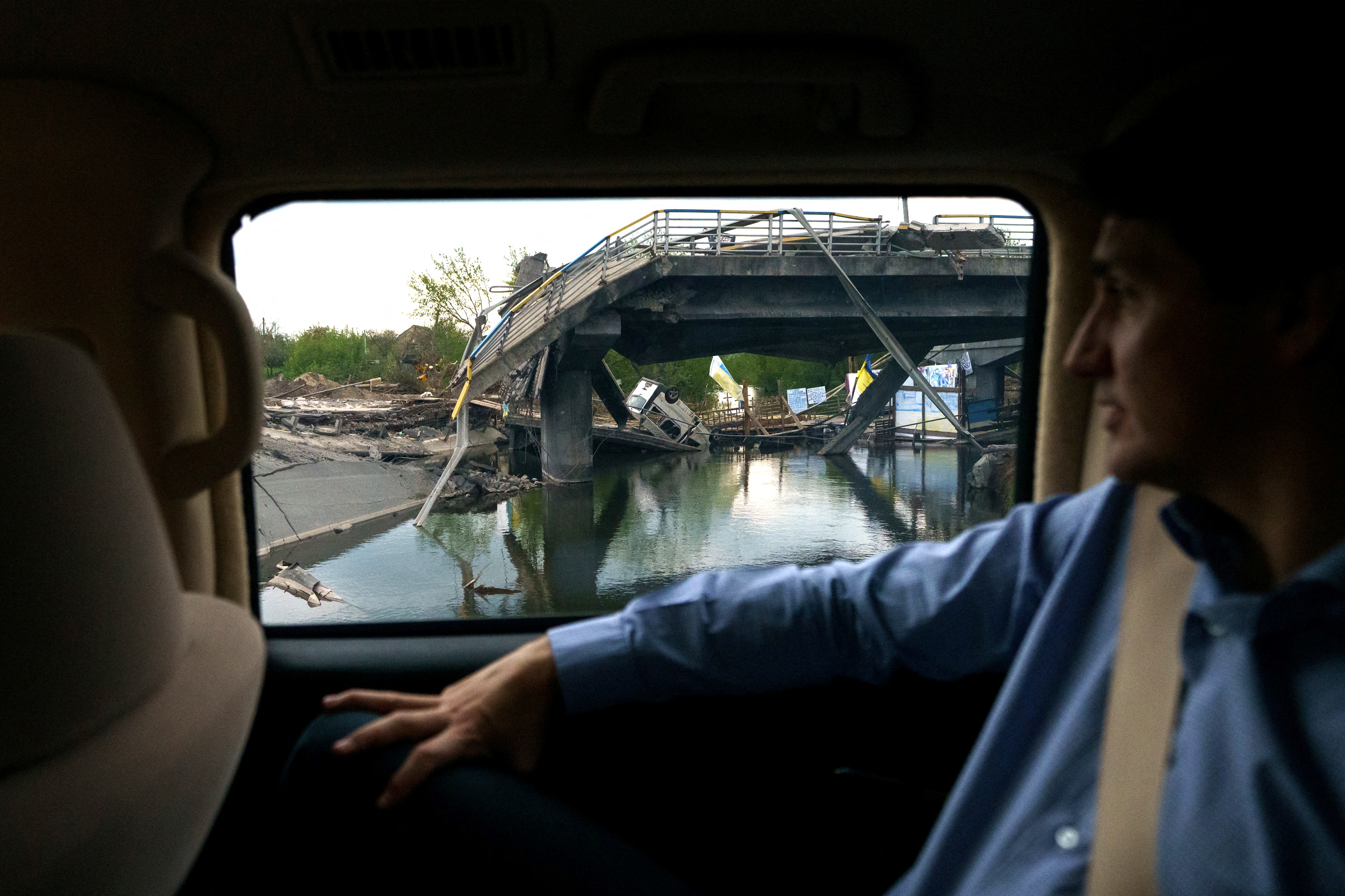 Canada's Prime Minister Justin Trudeau visits a destroyed neighborhood in Irpin