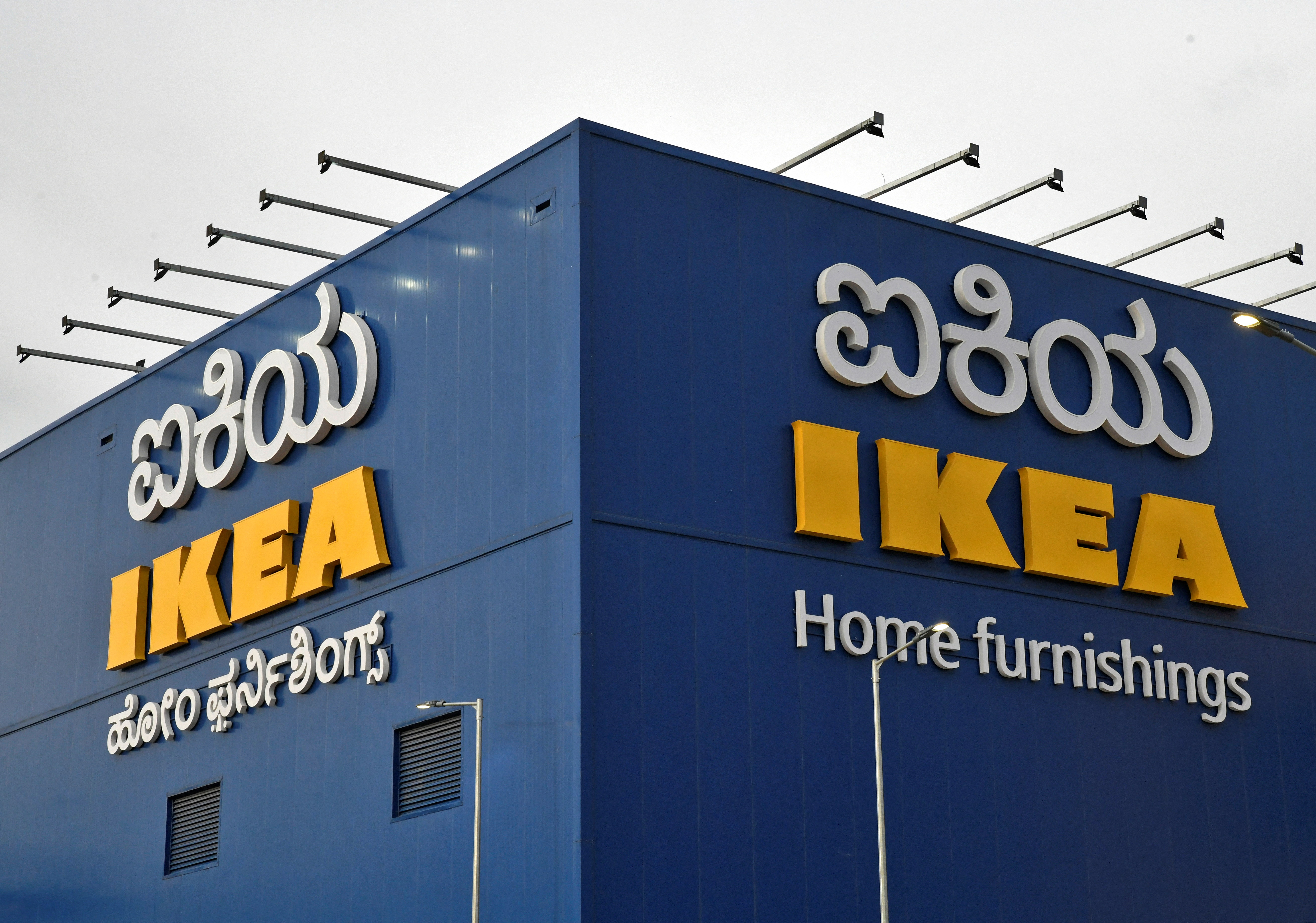 The logo of IKEA is seen above its new store in Bengaluru