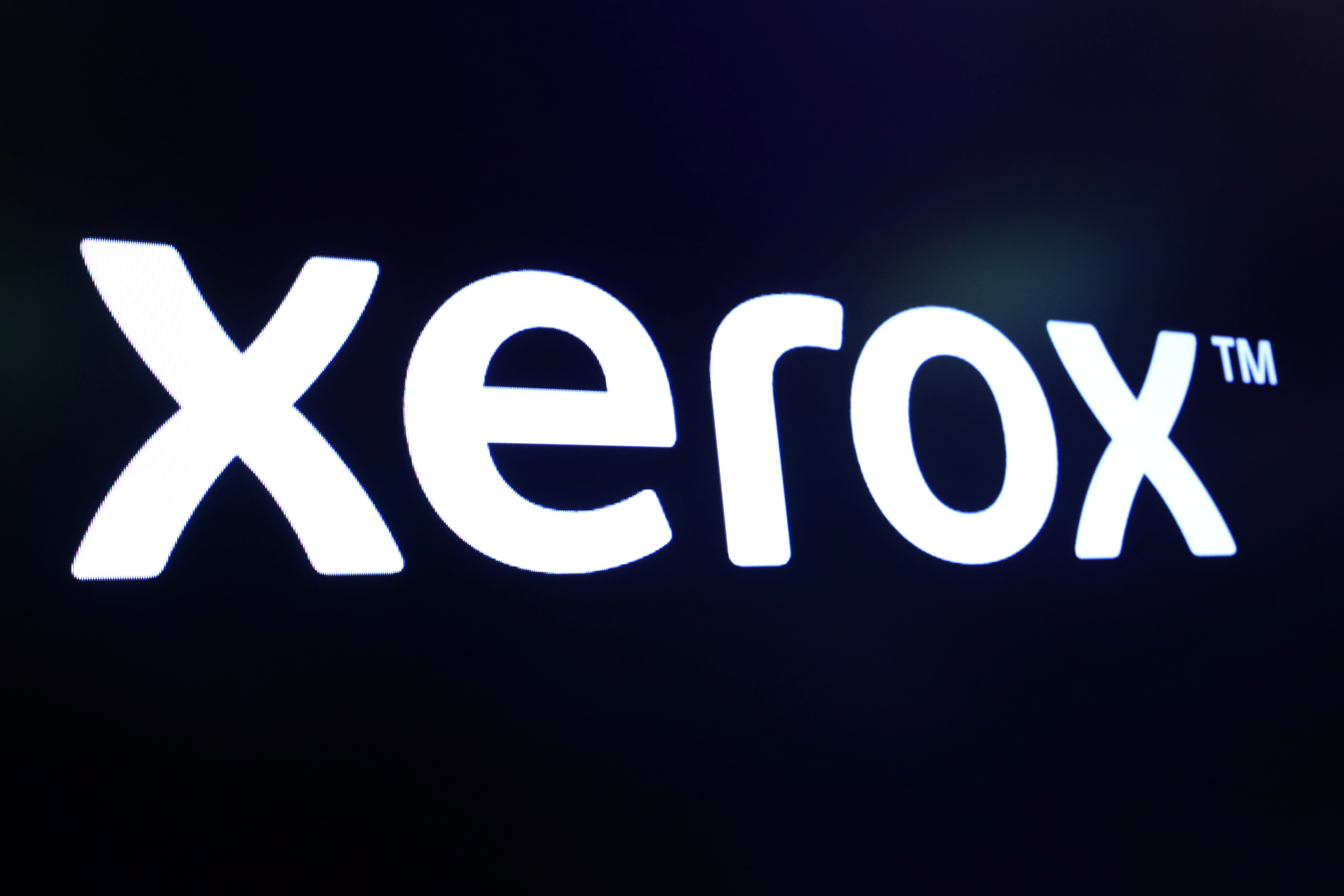 The company logo for Xerox is displayed on a screen on the floor of the NYSE in New York
