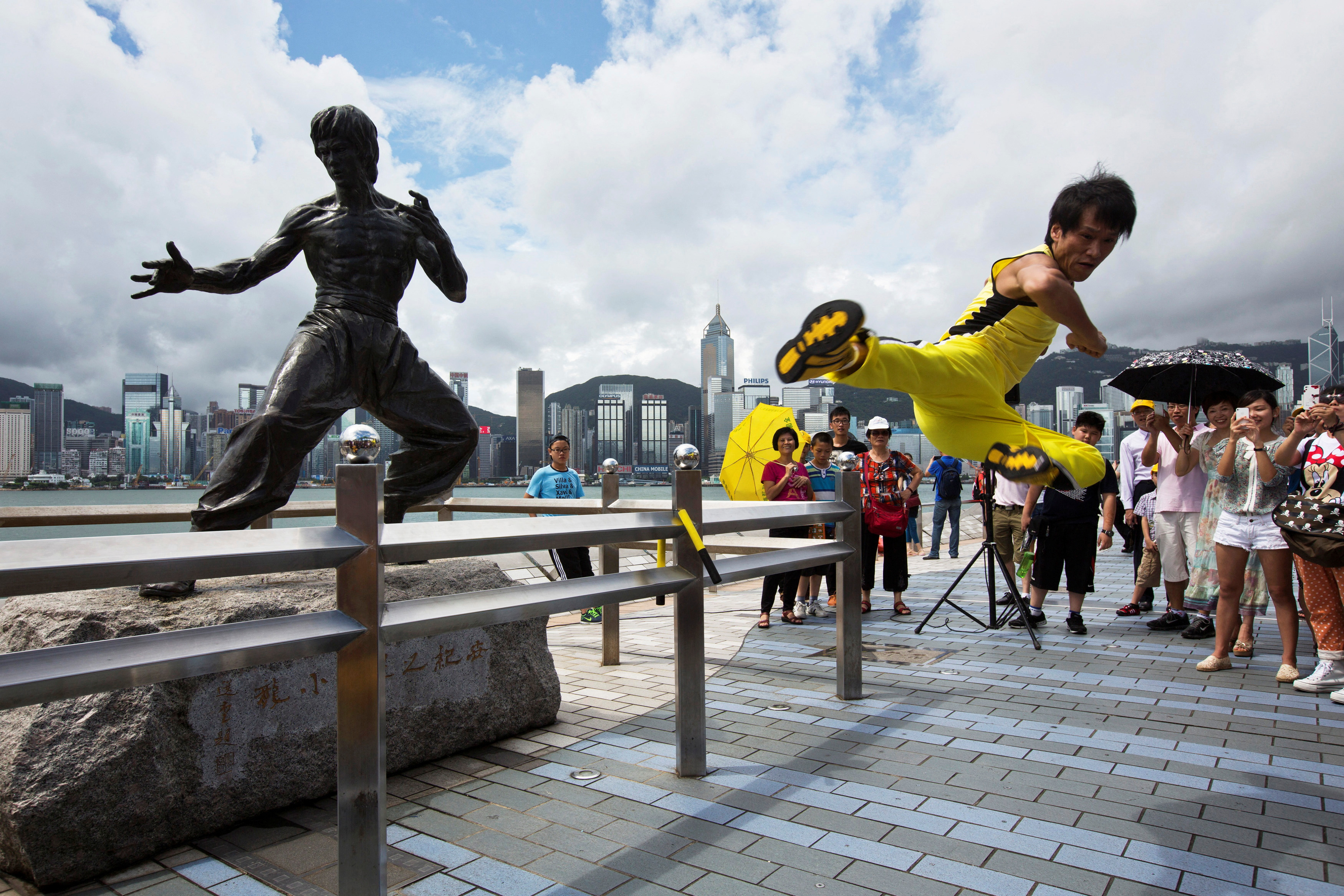 Fans flock to Hong Kong to mark 50th anniversary of Bruce Lee's death |  Reuters