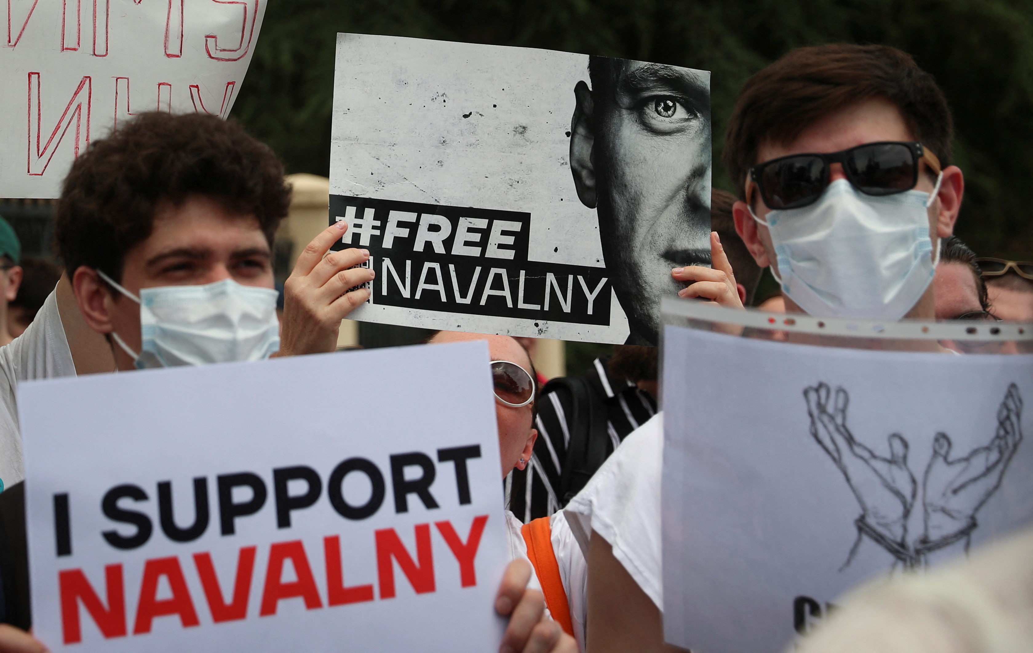 Activists hold a rally in support of jailed Russian opposition politician Alexei Navalny in Tbilisi