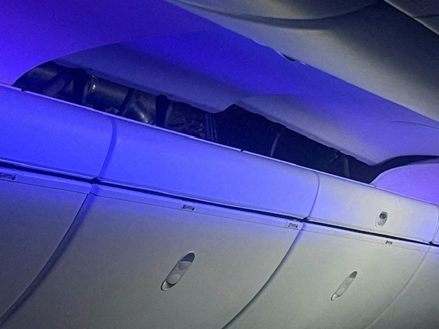 A view of the damage sustained to the ceiling of the airplane after an incident on a LATAM Airlines Boeing 787, in Auckland