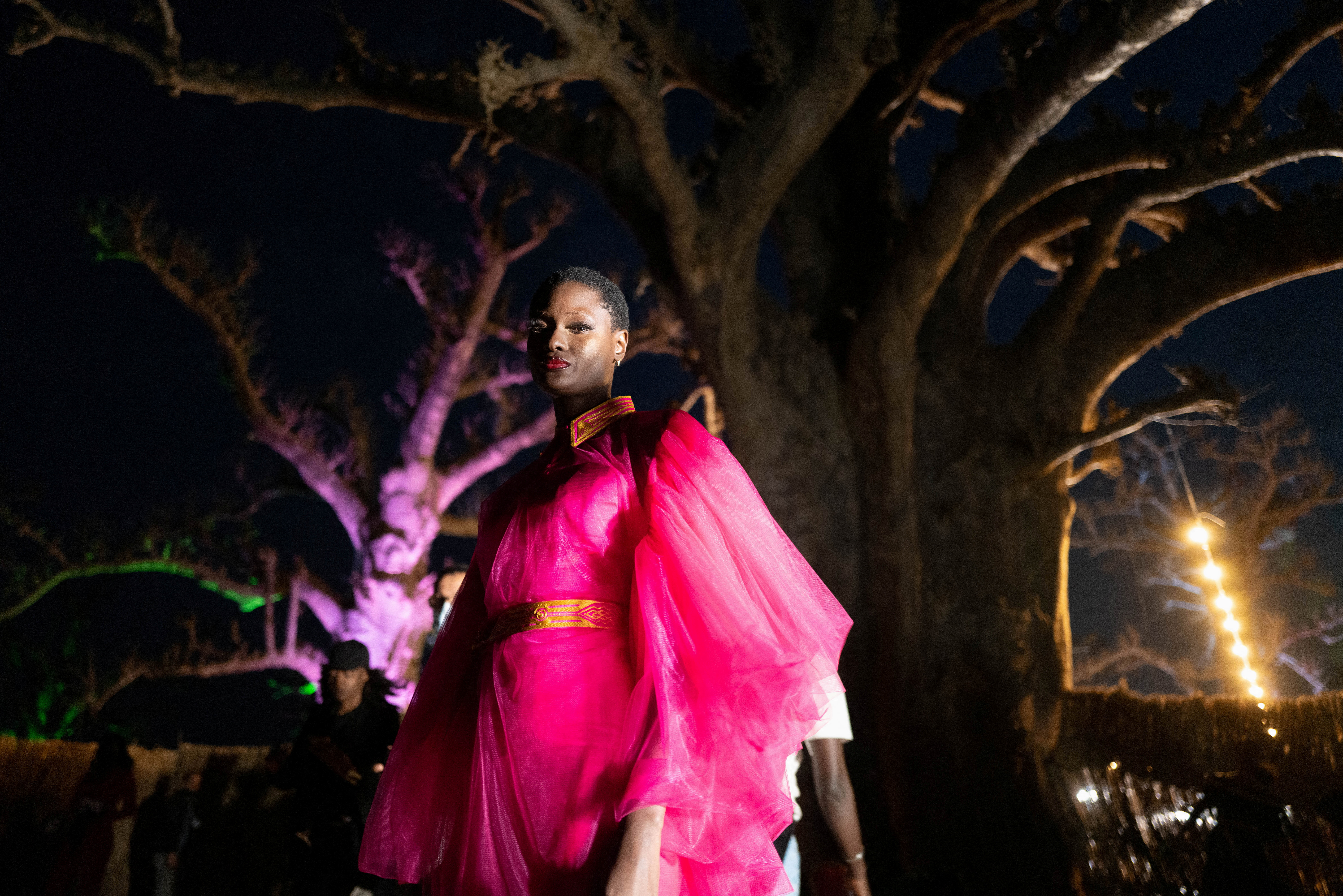 A model waits backstage during the 19th annual Dakar Fashion Week, at the Baobad forest